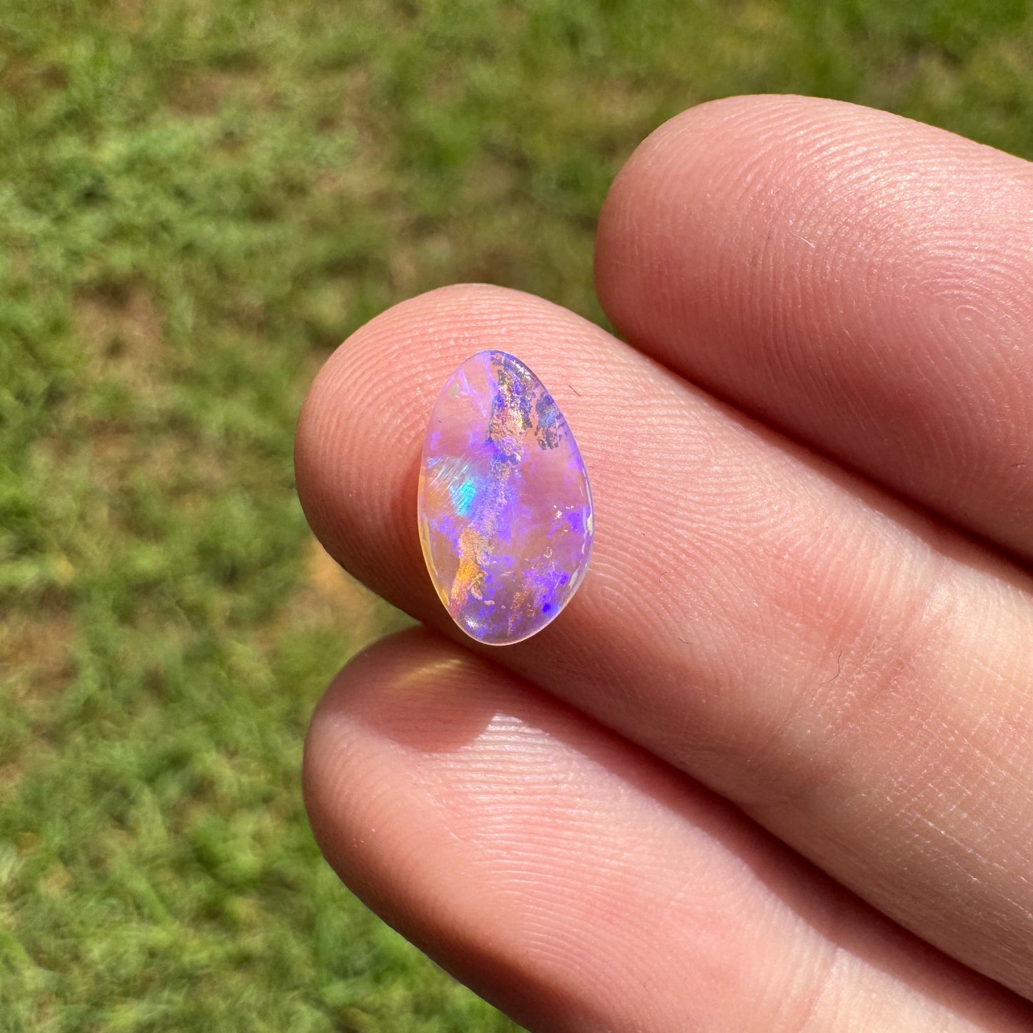0.68 Ct small wood replacement boulder opal