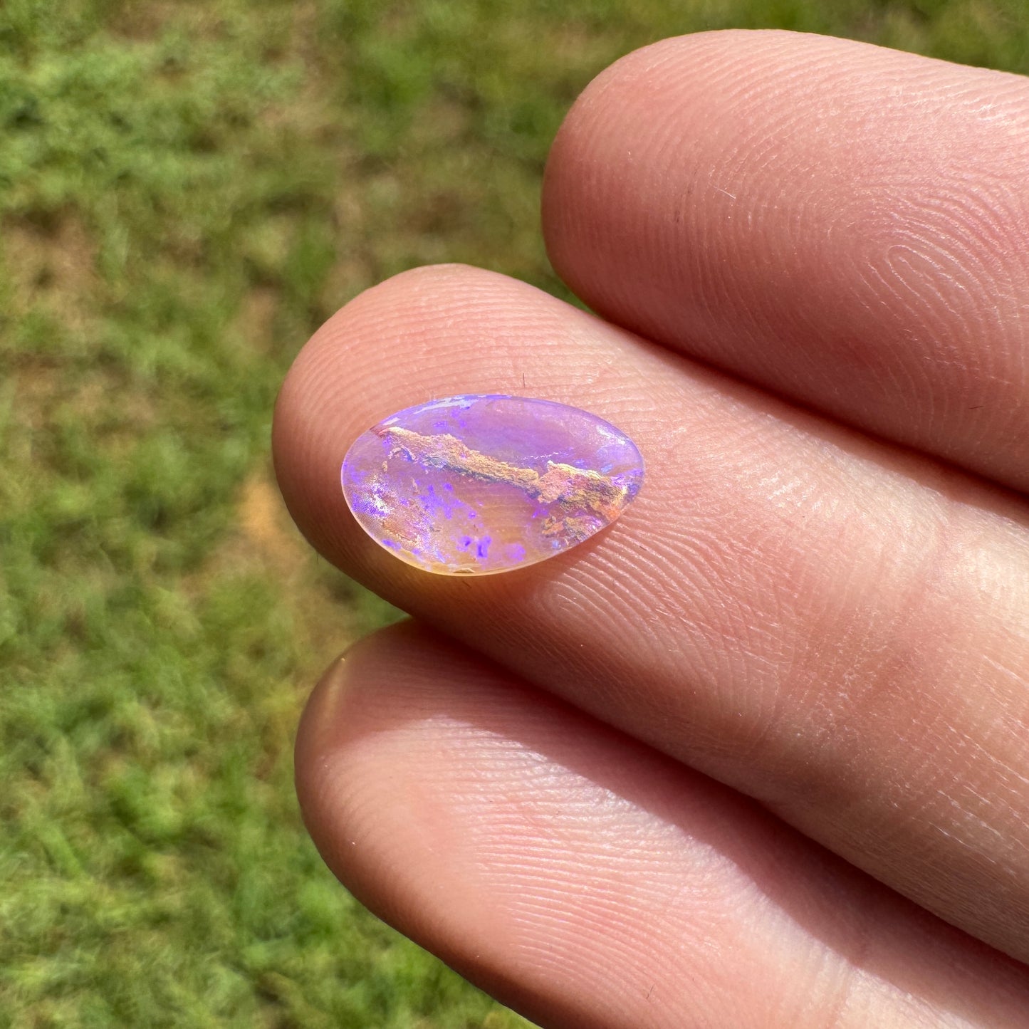 0.68 Ct small wood replacement boulder opal