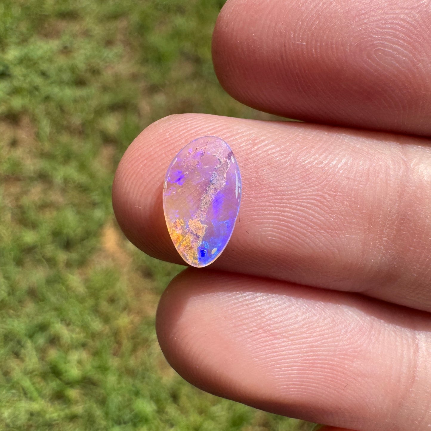 0.68 Ct small wood replacement boulder opal