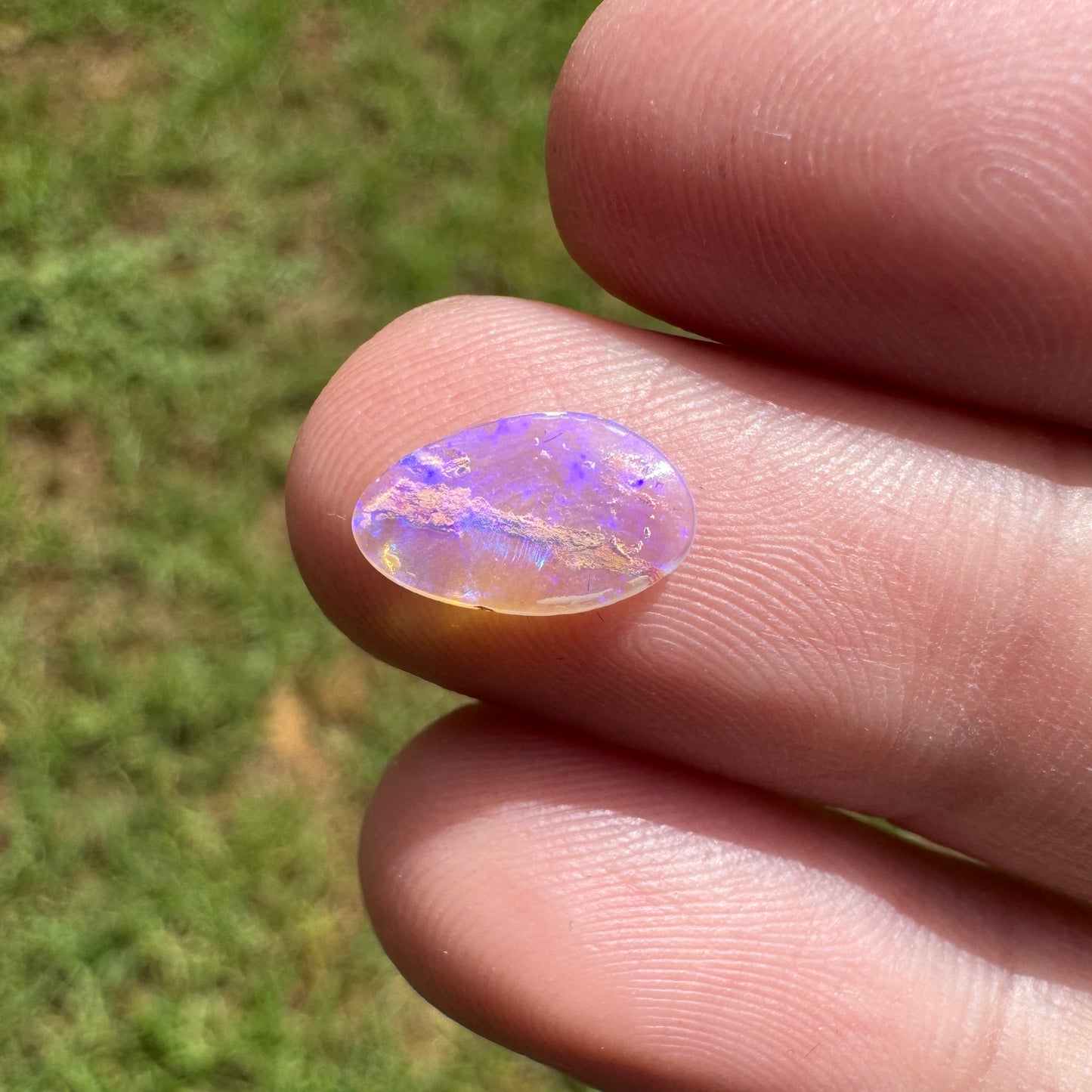 0.68 Ct small wood replacement boulder opal
