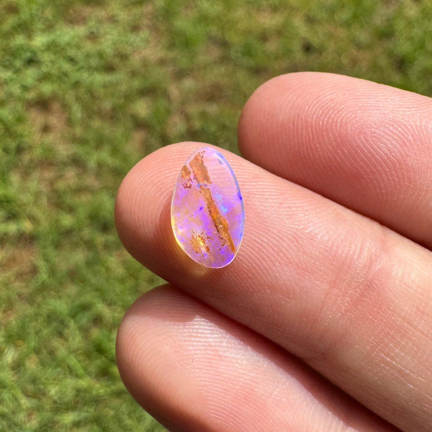 0.68 Ct small wood replacement boulder opal