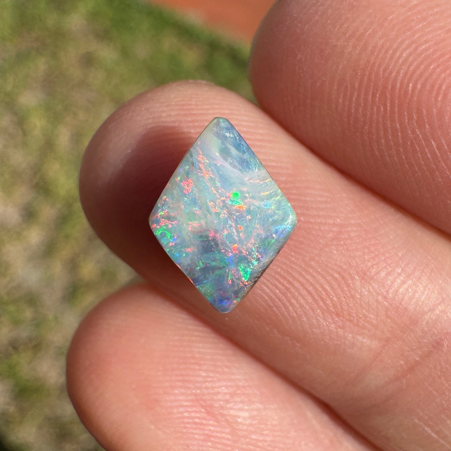 1.35 Ct pink and green diamond-shaped boulder opal