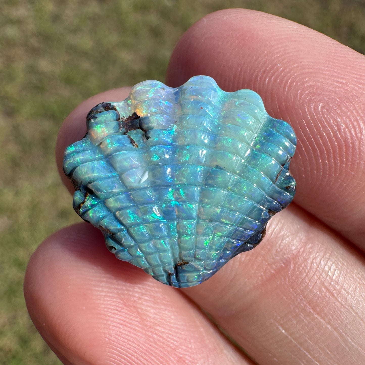 10.22 Ct shell boulder opal carving