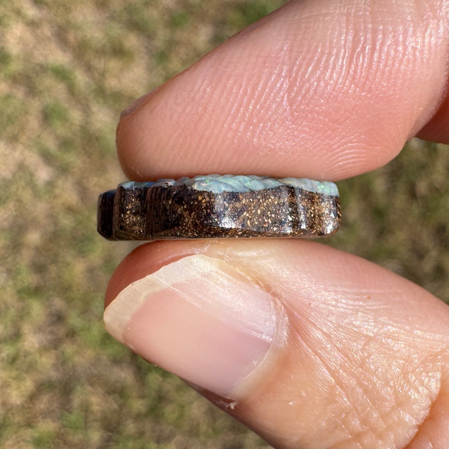 9.11 Ct gem-grade shell boulder opal carving