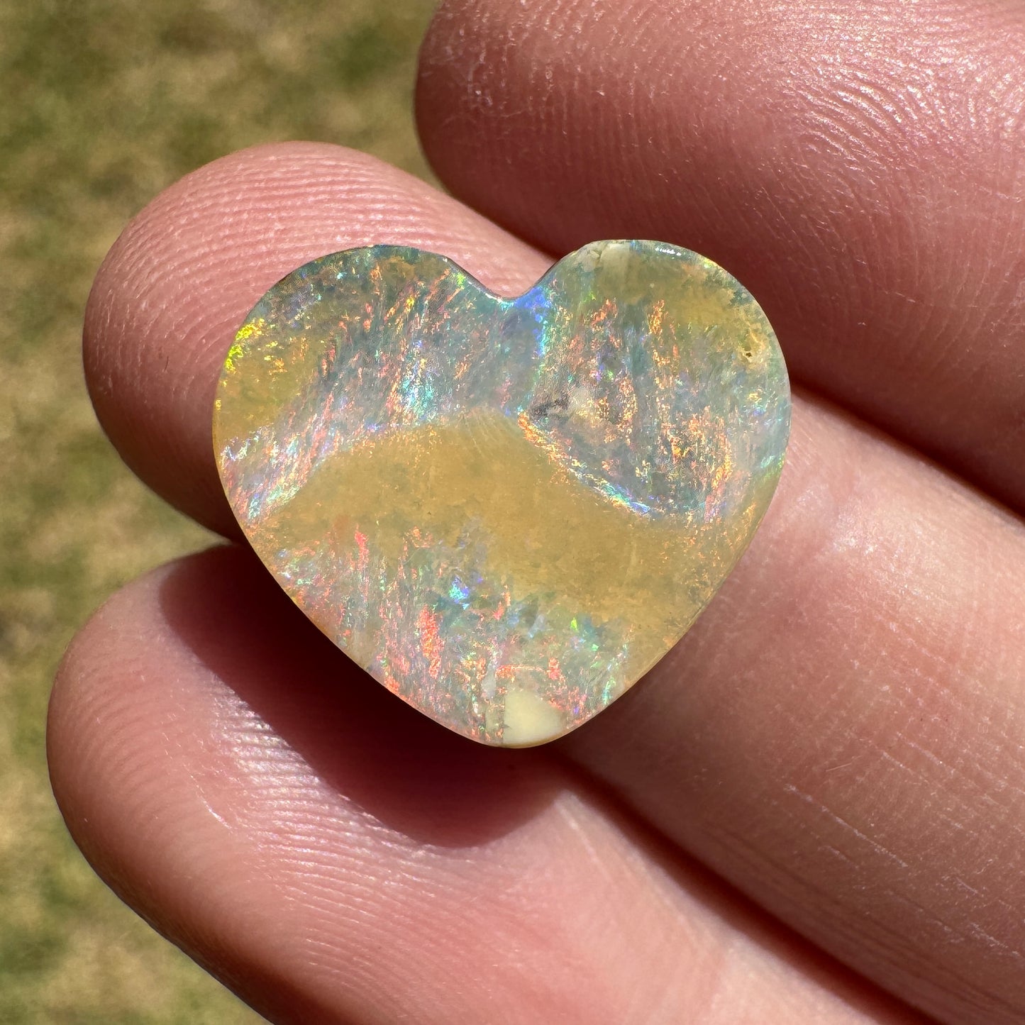 5.65 Ct rainbow and caramel swirl heart boulder opal