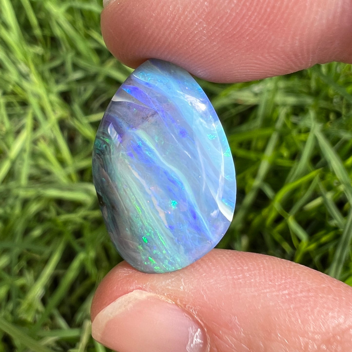 19.97 Ct green-blue striped boulder opal