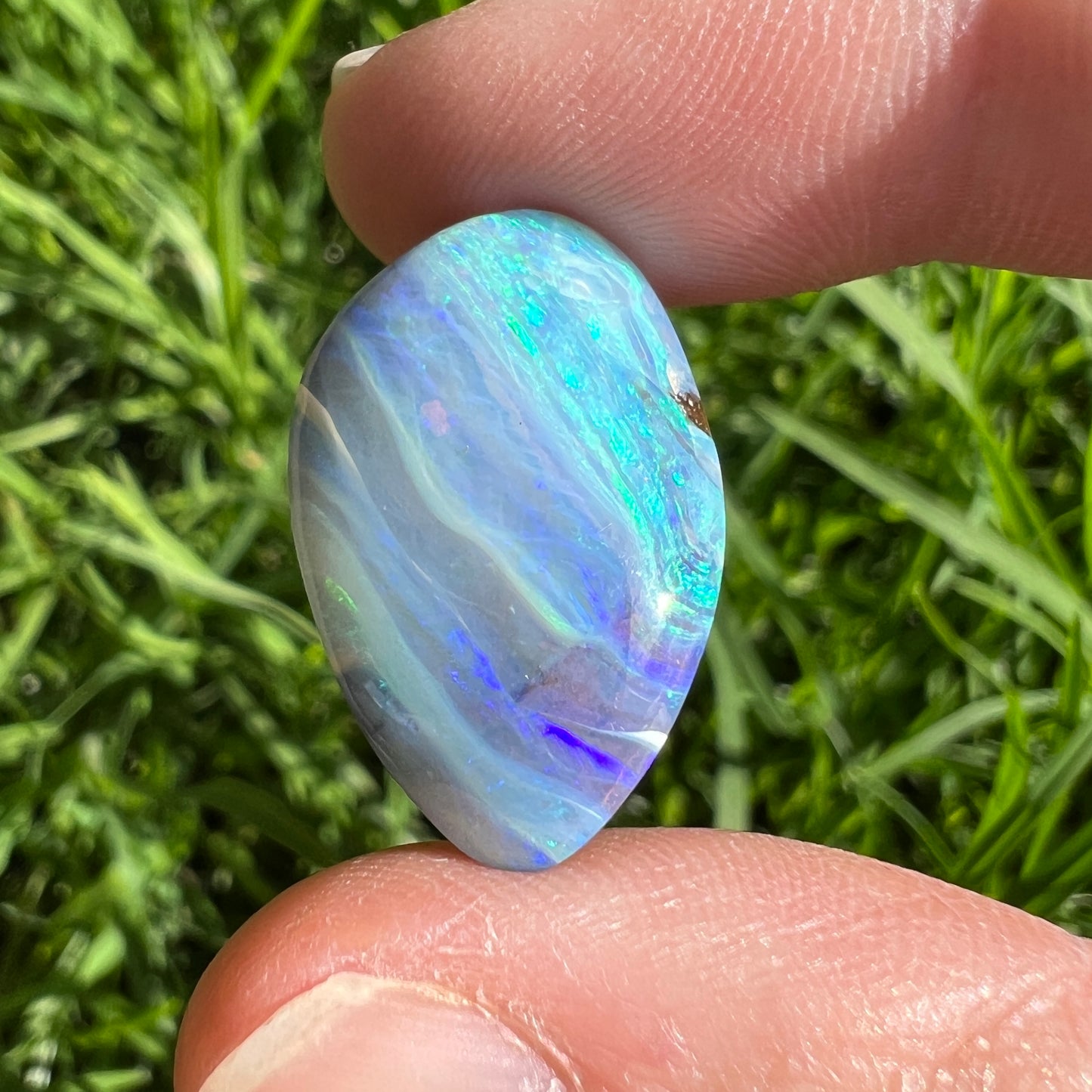 19.97 Ct green-blue striped boulder opal