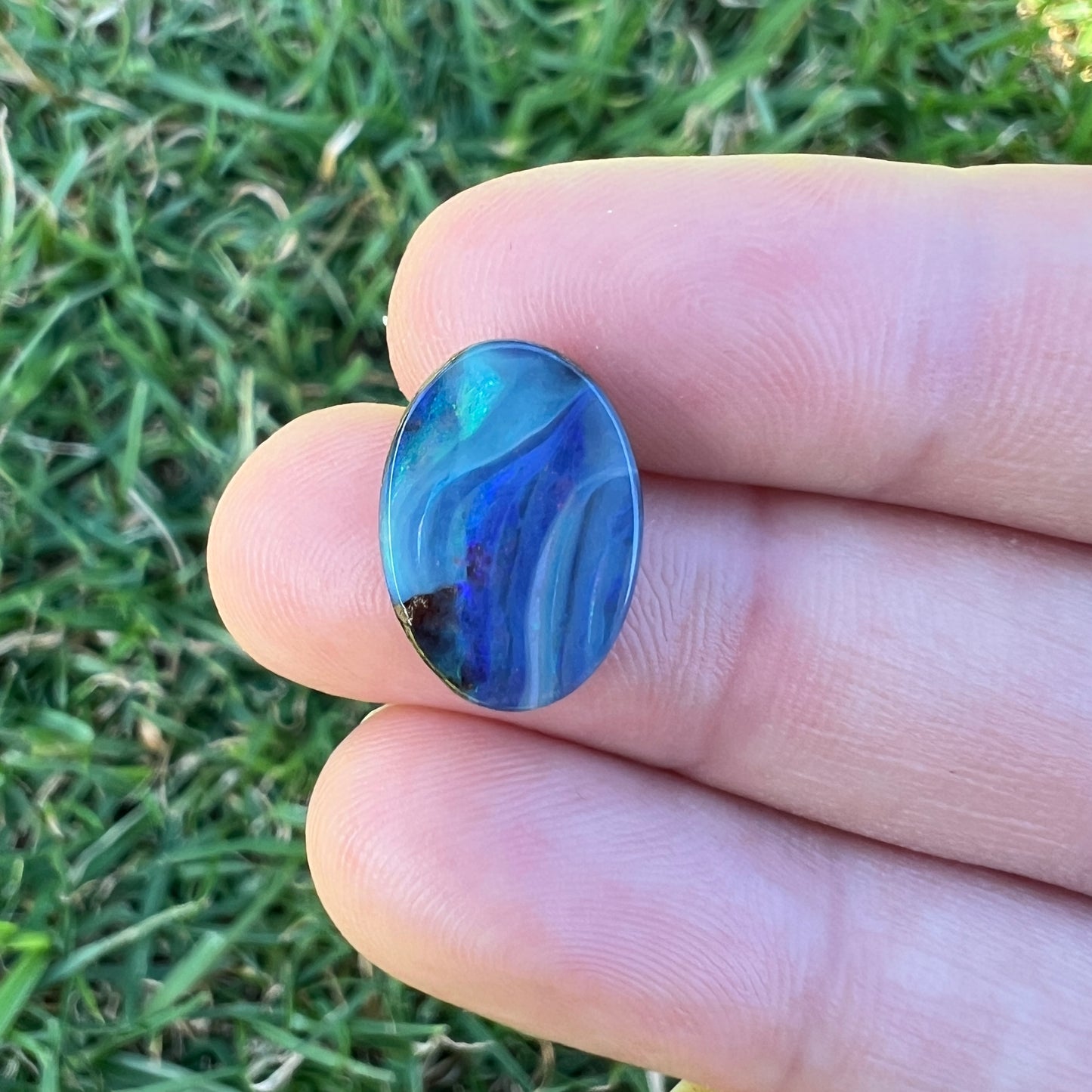 4.75 Ct stripy oval boulder opal