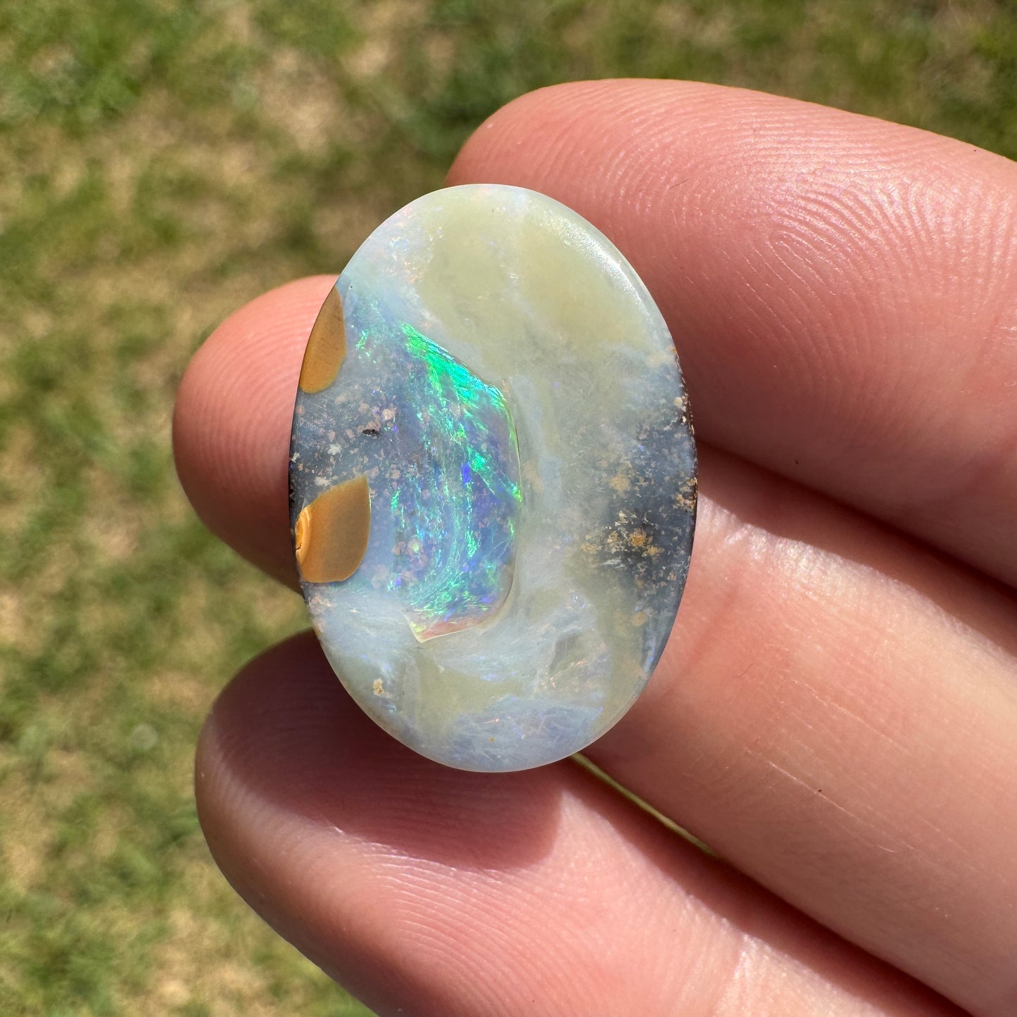 10.94 Ct oval boulder opal