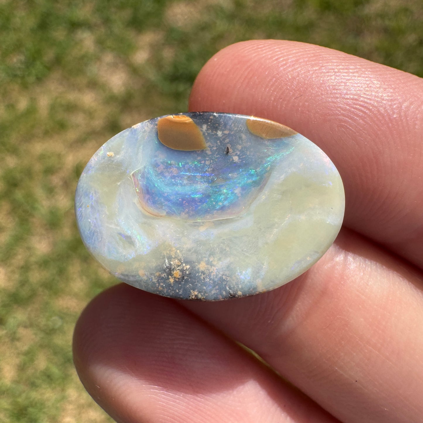 10.94 Ct oval boulder opal