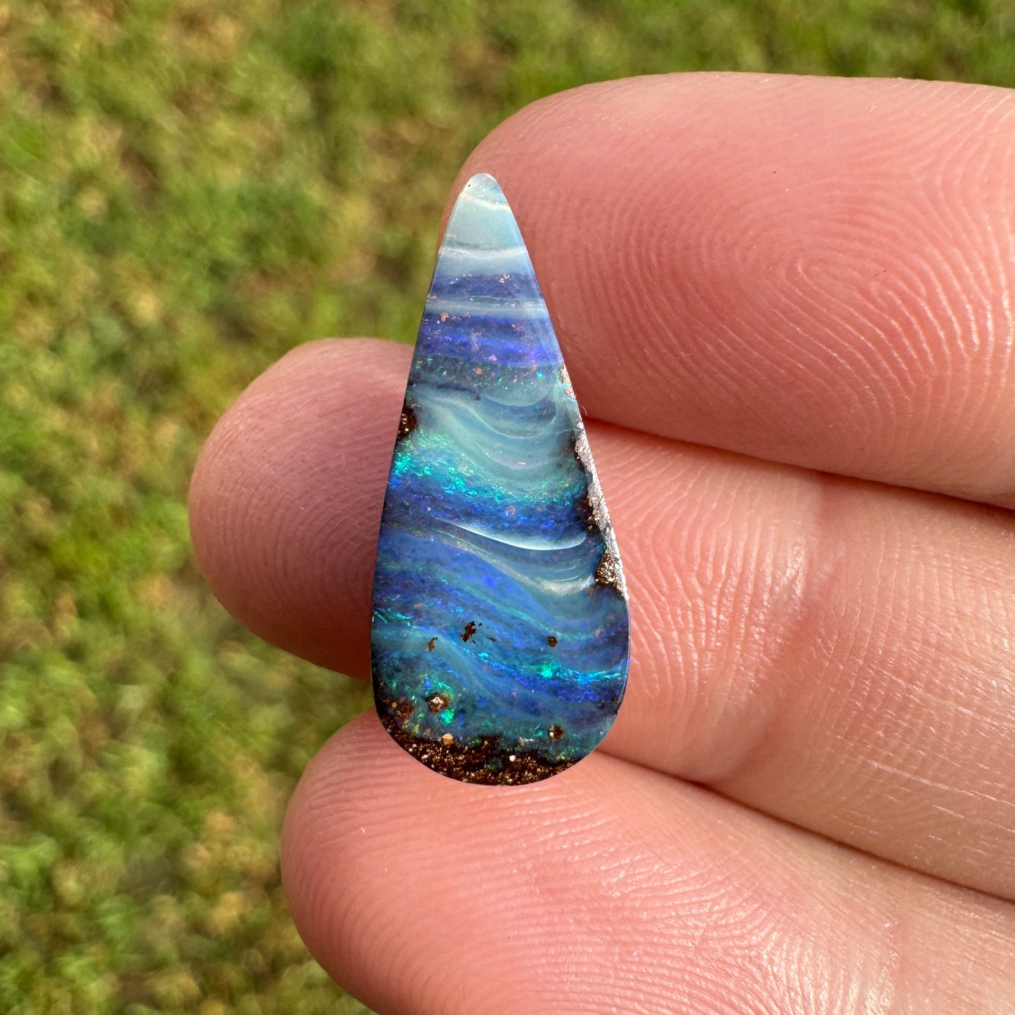 4.27 Ct stripy teardrop boulder opal.