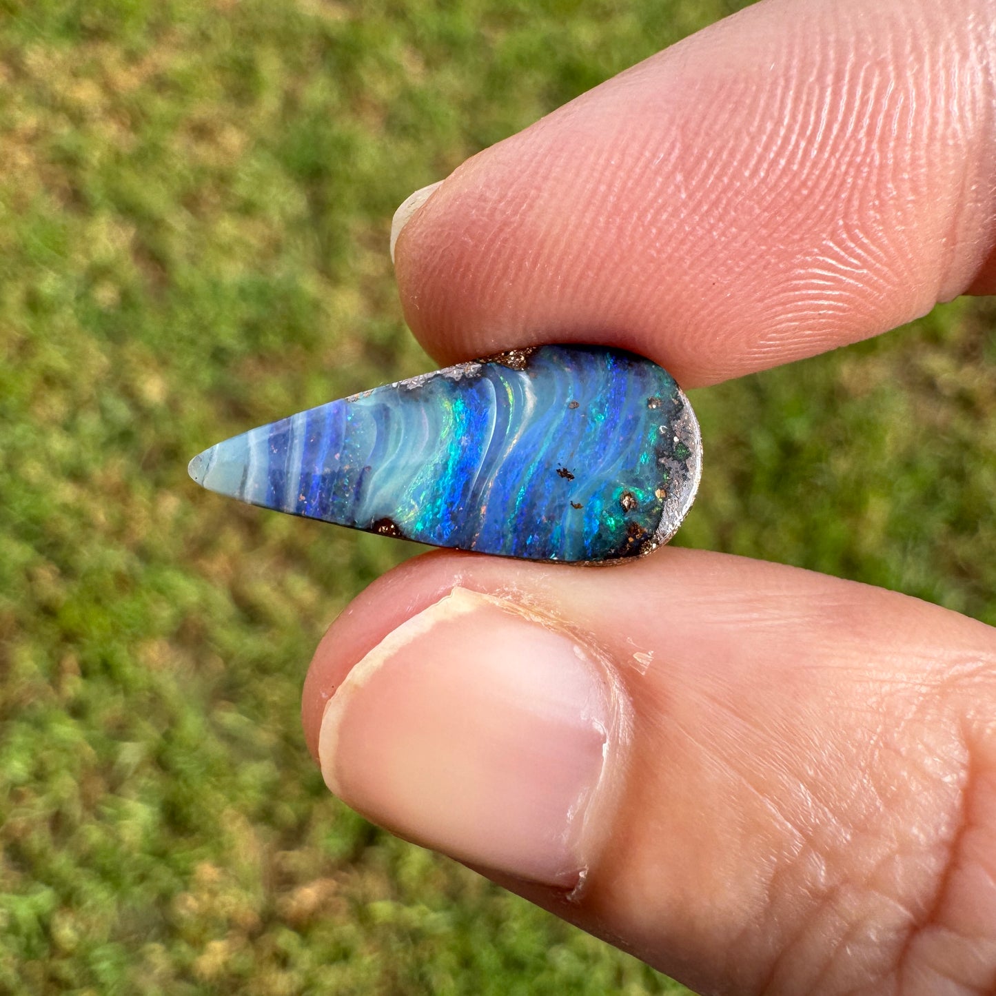 4.27 Ct stripy teardrop boulder opal.