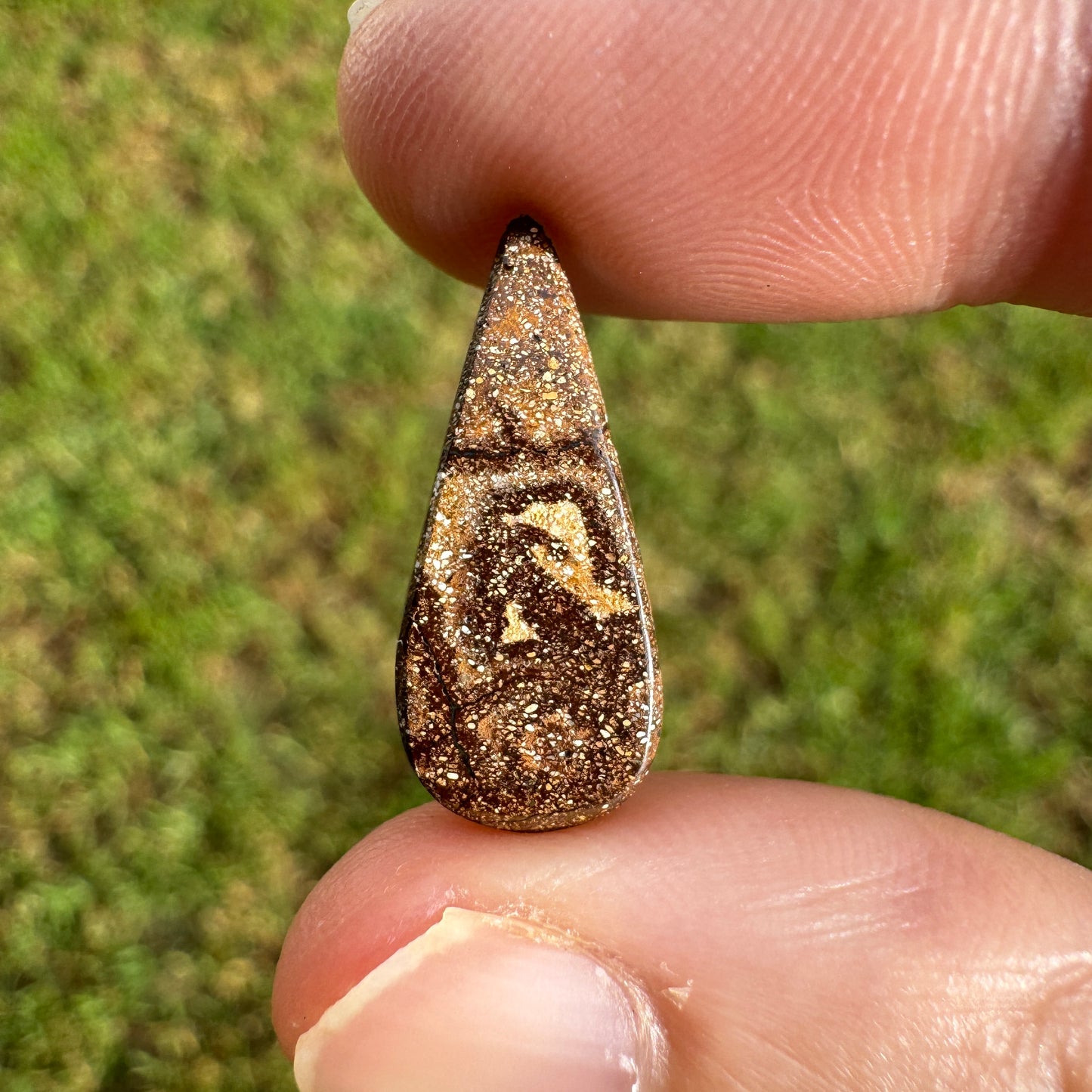 4.27 Ct stripy teardrop boulder opal.