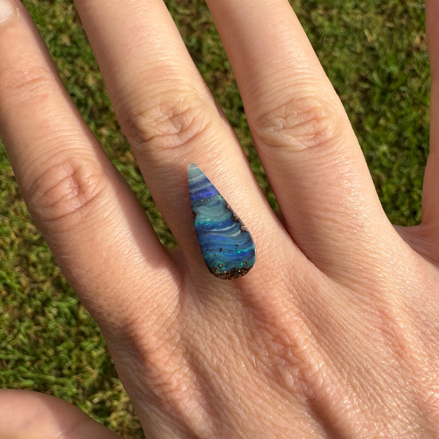 4.27 Ct stripy teardrop boulder opal.