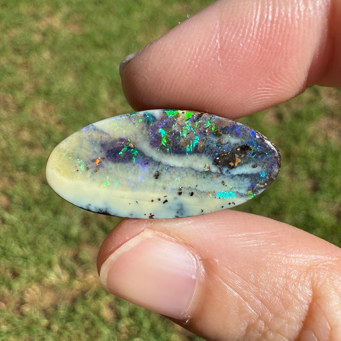 16.03 Ct green and purple boulder opal