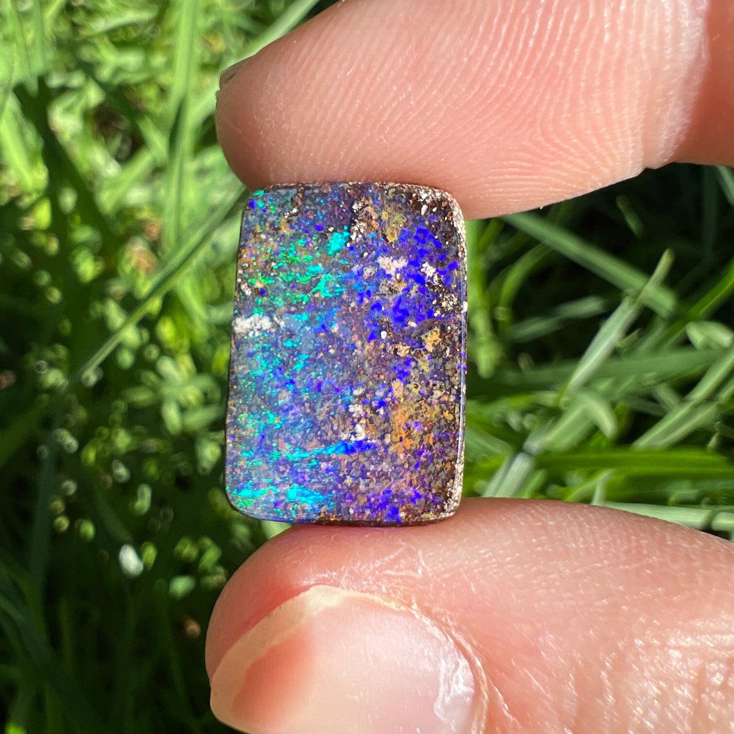 7.54 Ct purple and green boulder opal