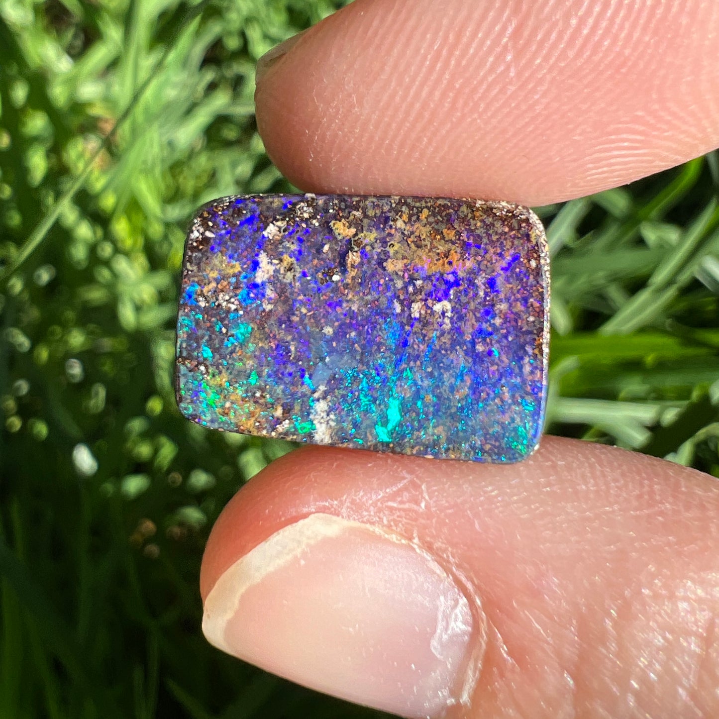 7.54 Ct purple and green boulder opal