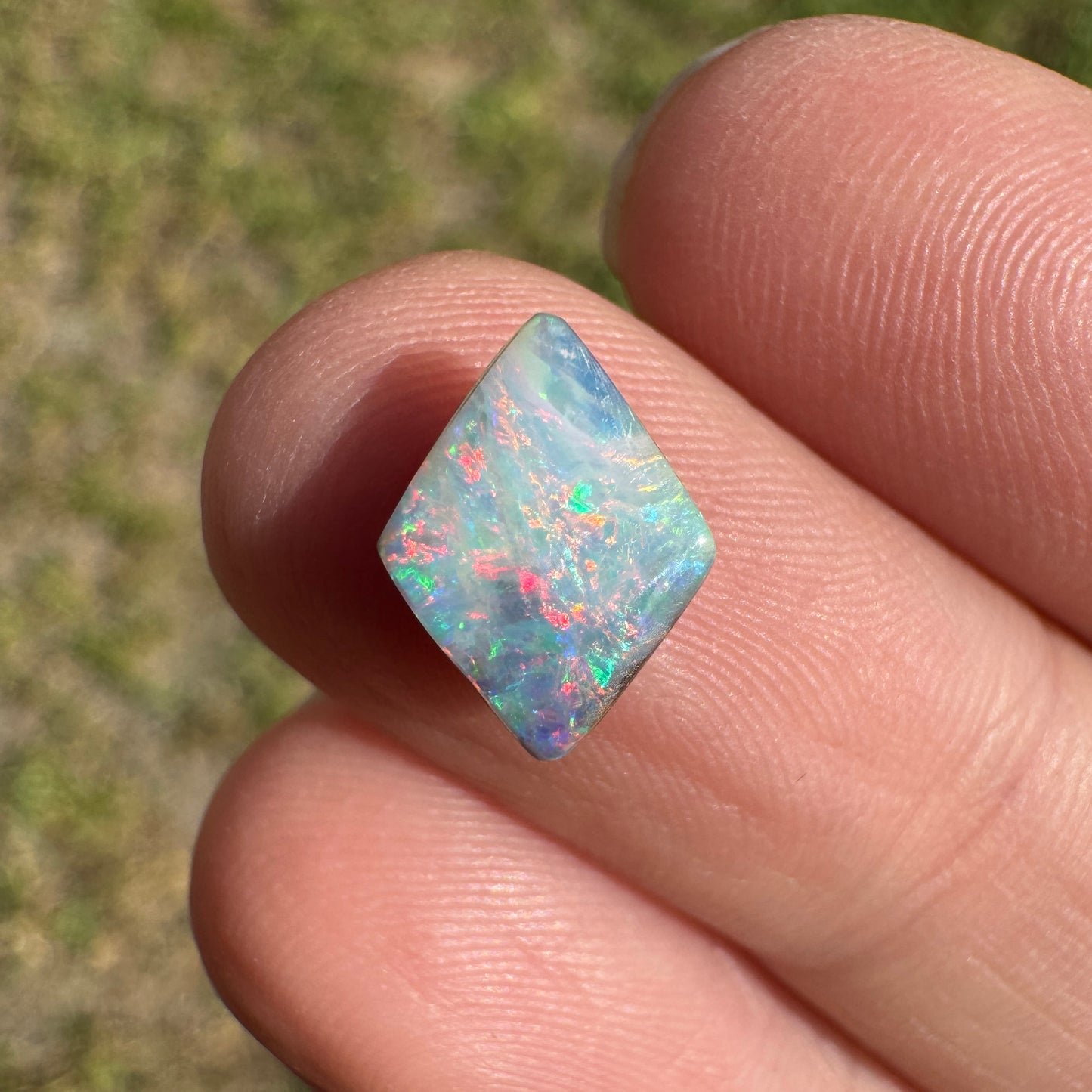 1.35 Ct pink and green diamond-shaped boulder opal