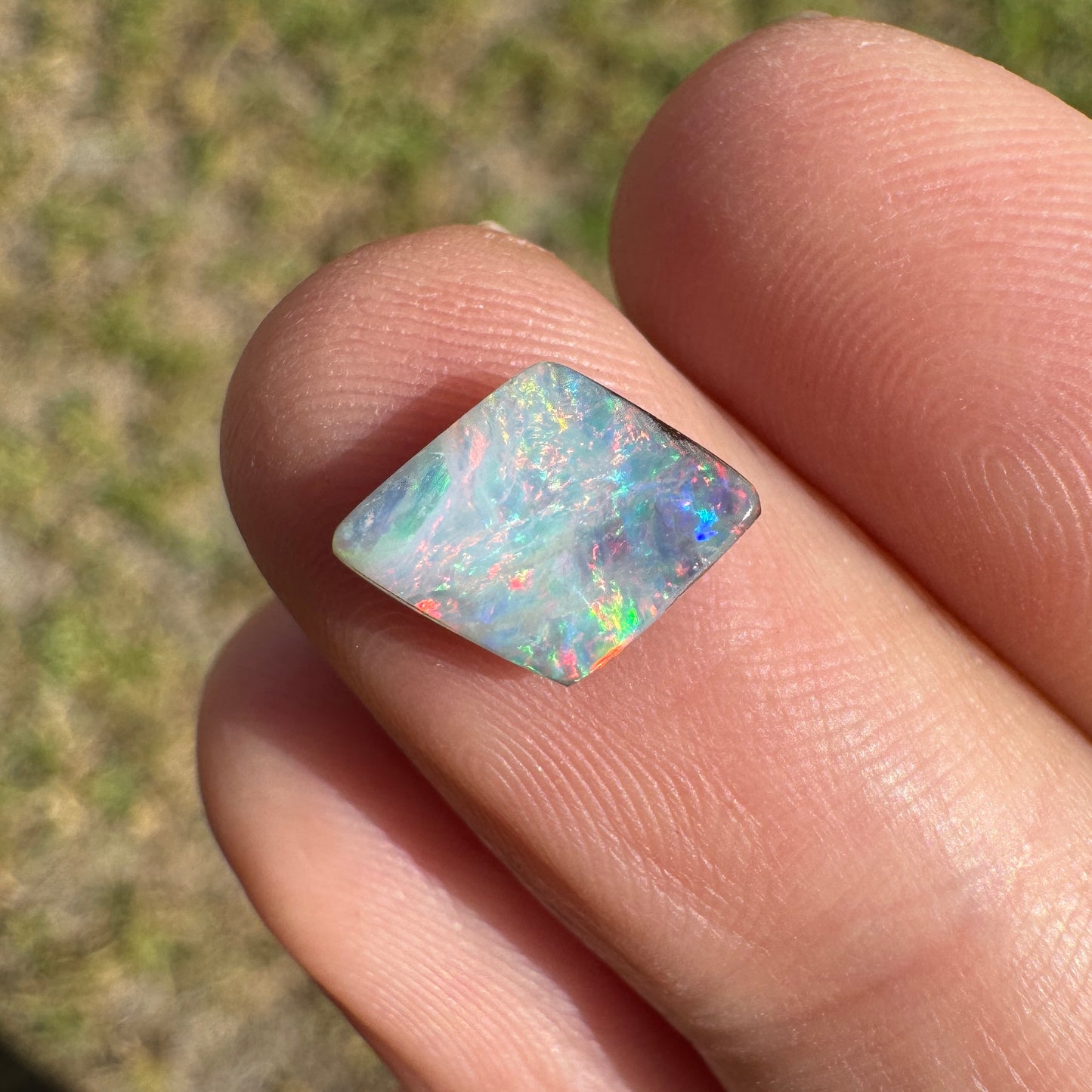 1.35 Ct pink and green diamond-shaped boulder opal