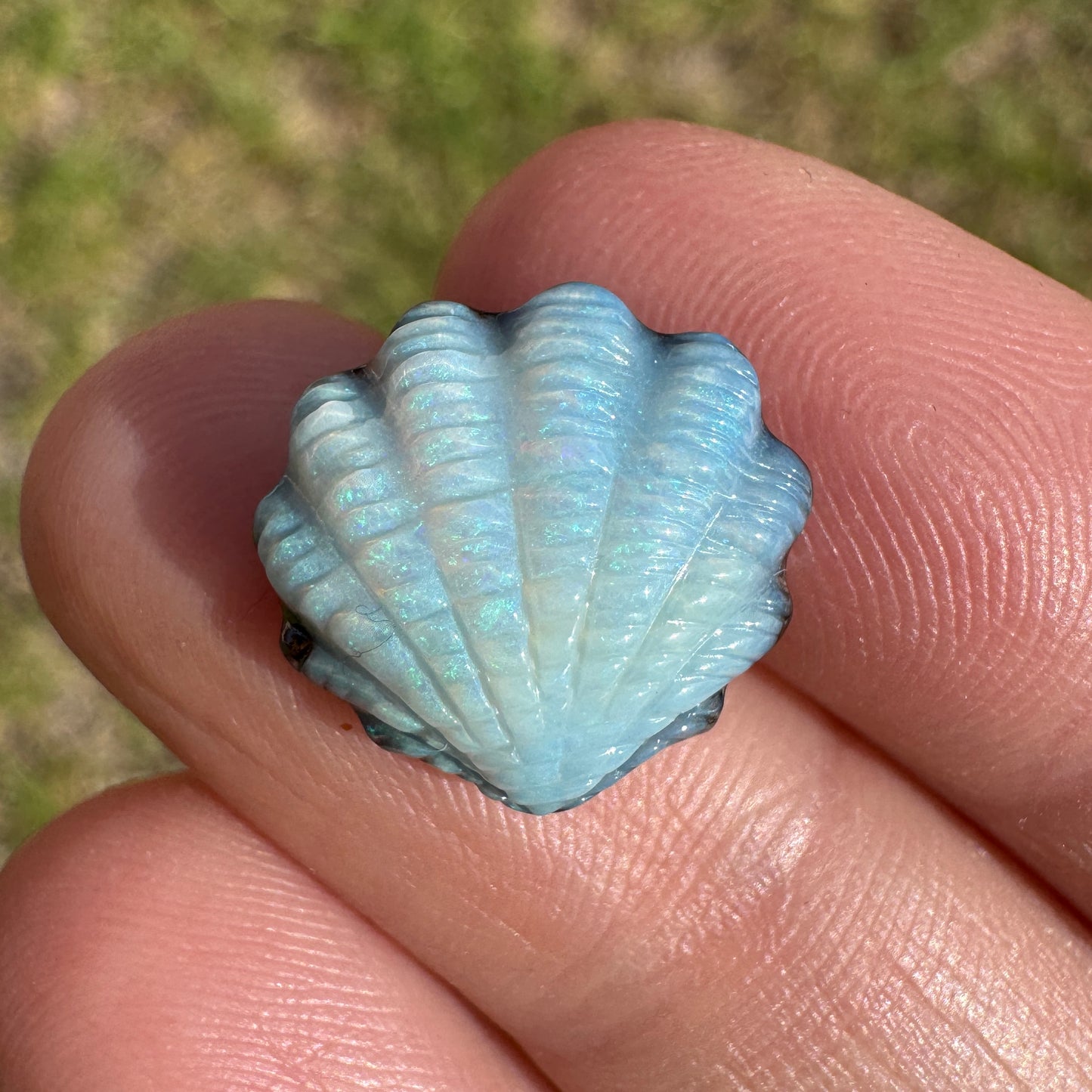6.10 Ct shell boulder opal carving