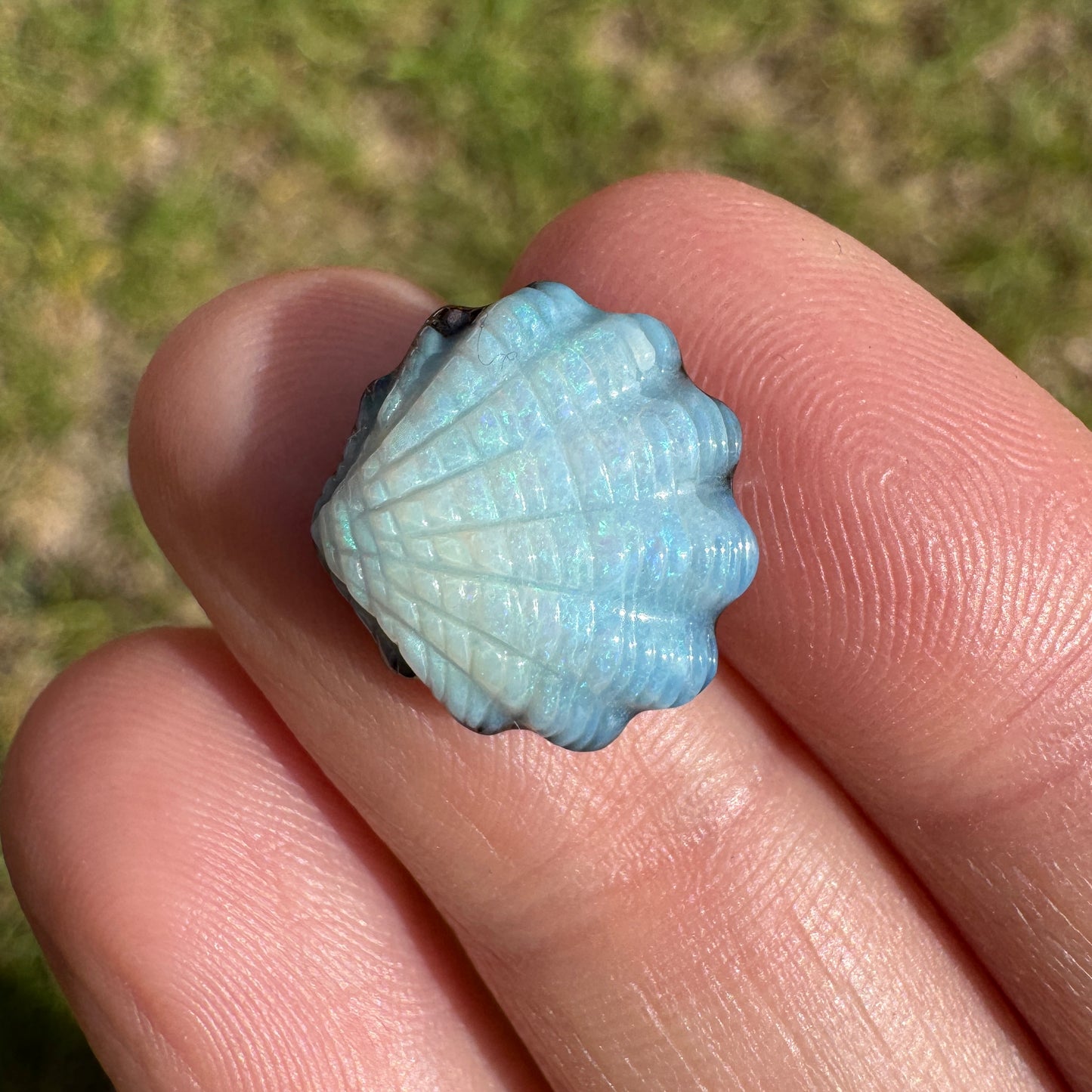 6.10 Ct shell boulder opal carving