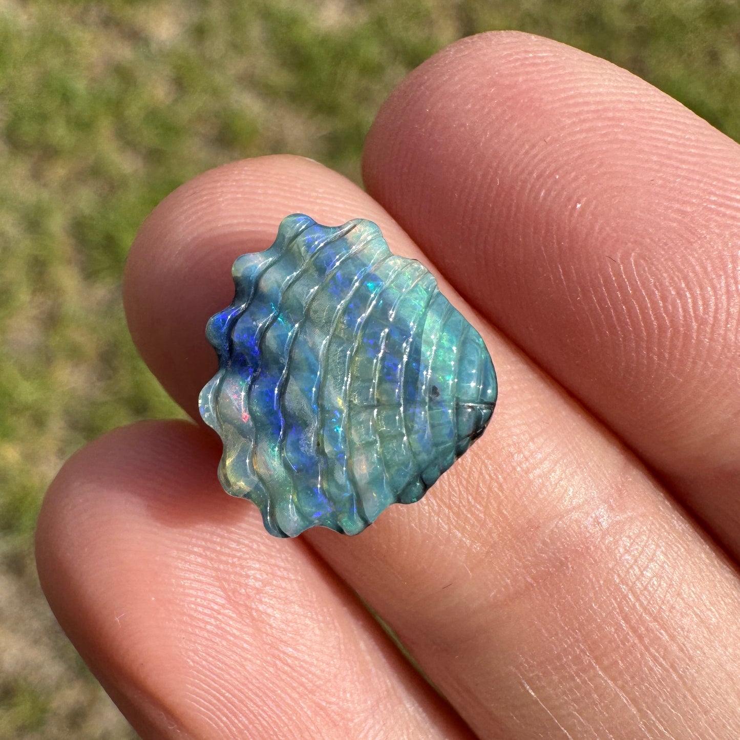 4.74 Ct shell boulder opal carving