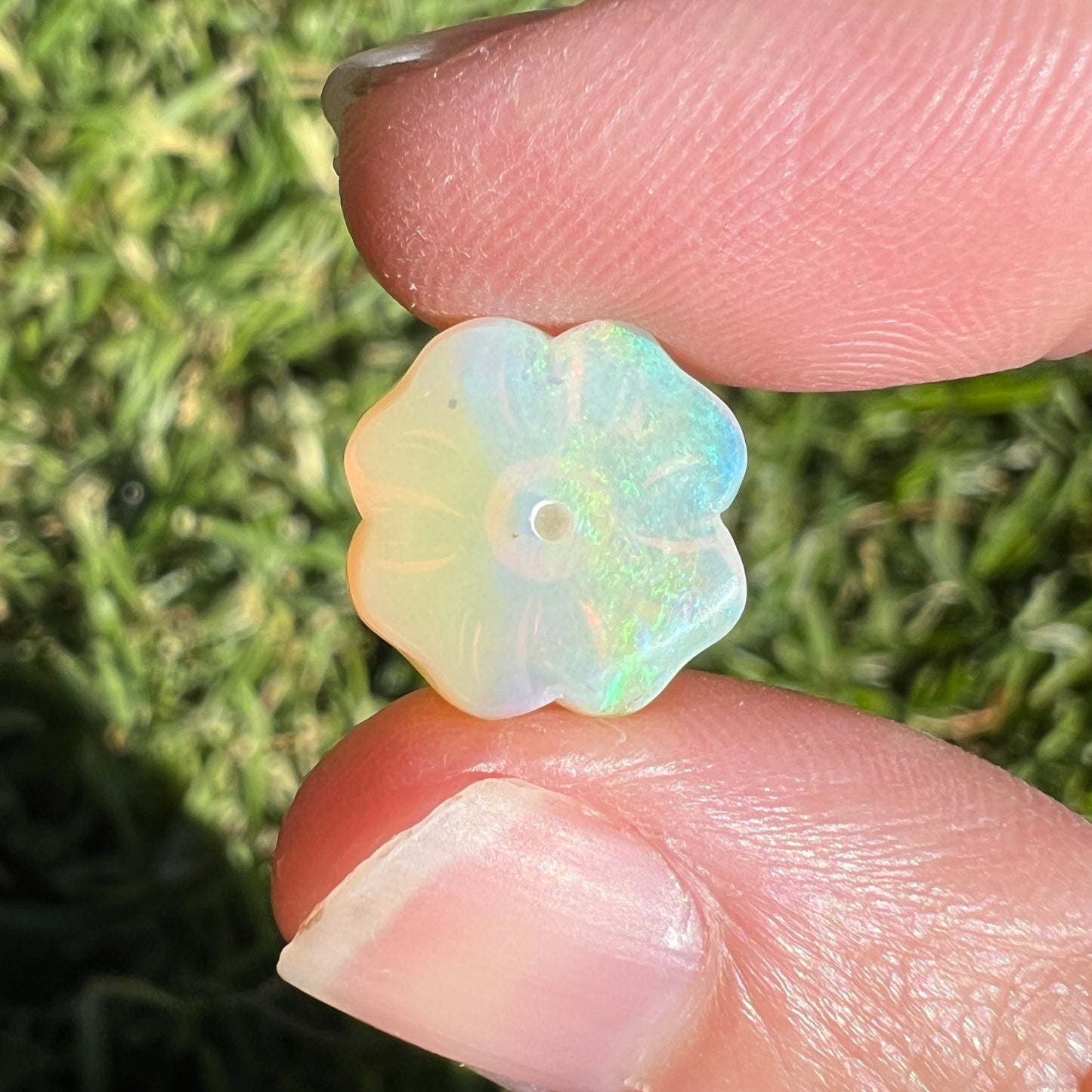 3.16 Ct carved flower opal