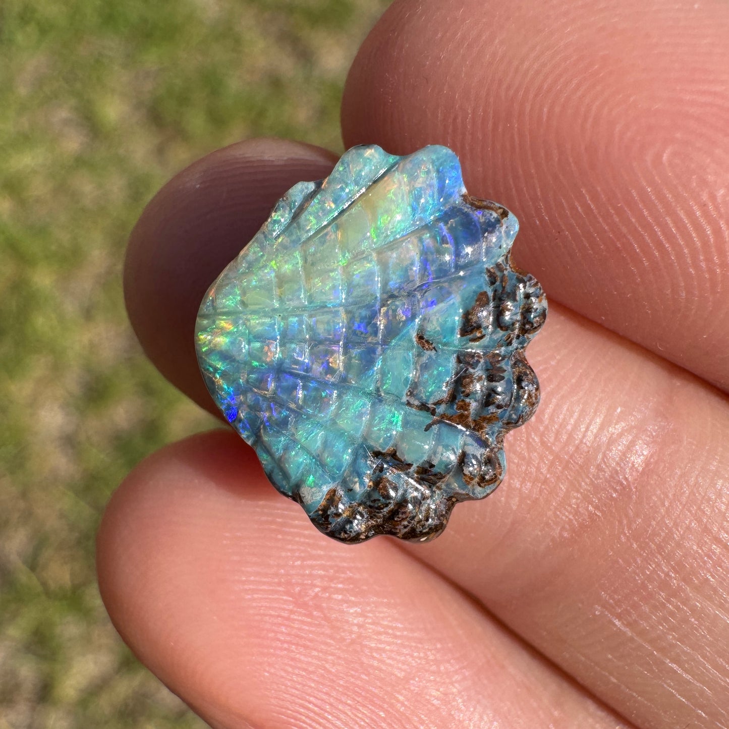 6.94 Ct shell boulder opal carving