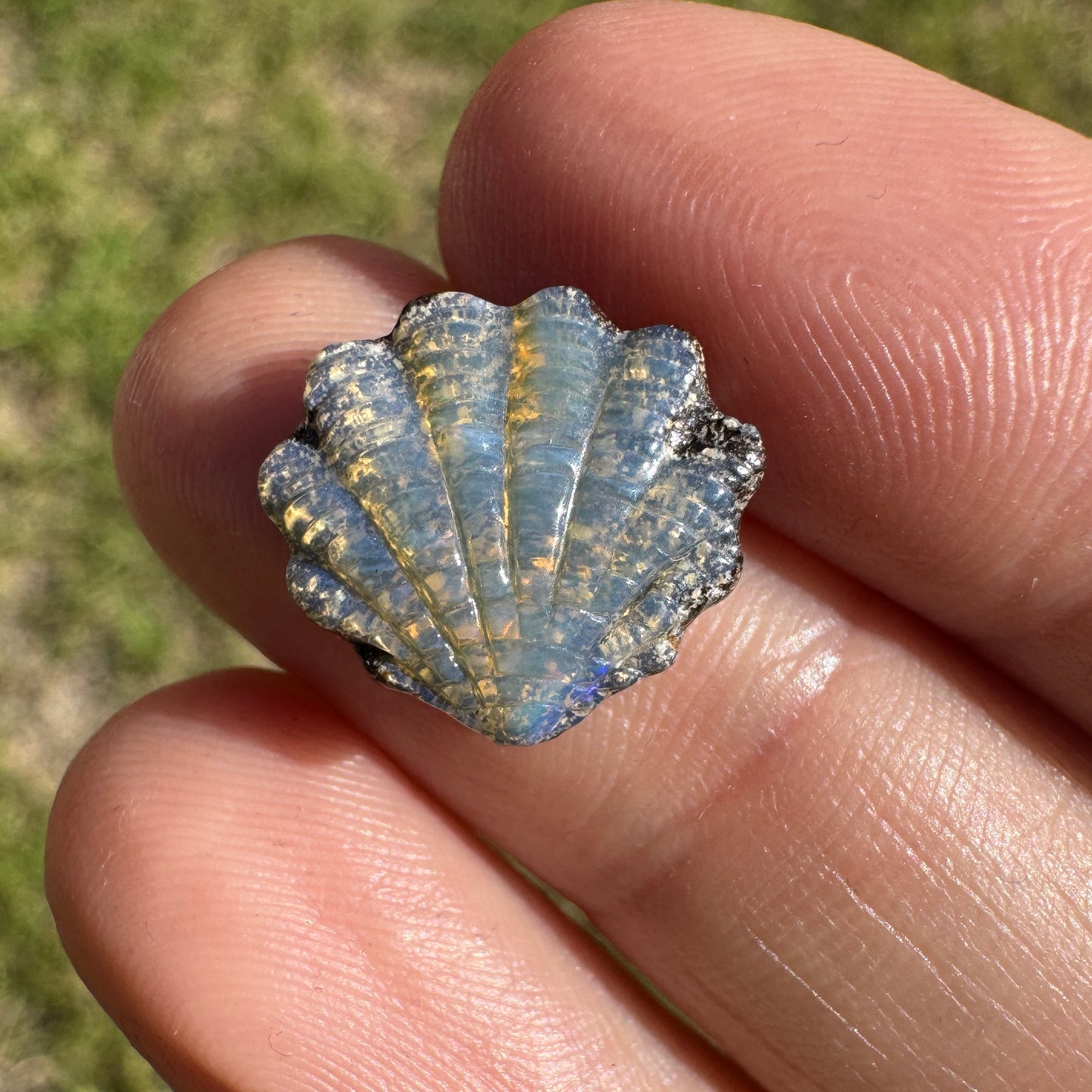 4.58 Ct shell boulder opal carving