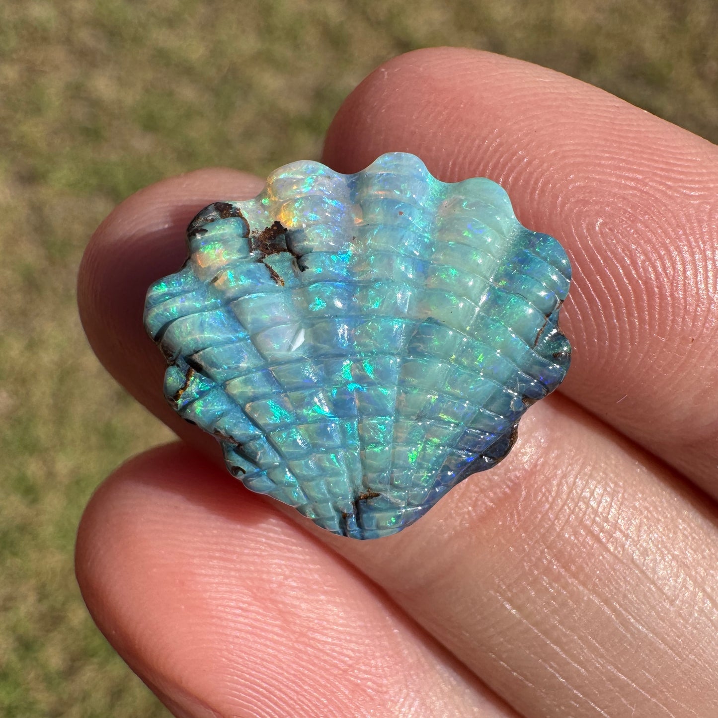 10.22 Ct shell boulder opal carving