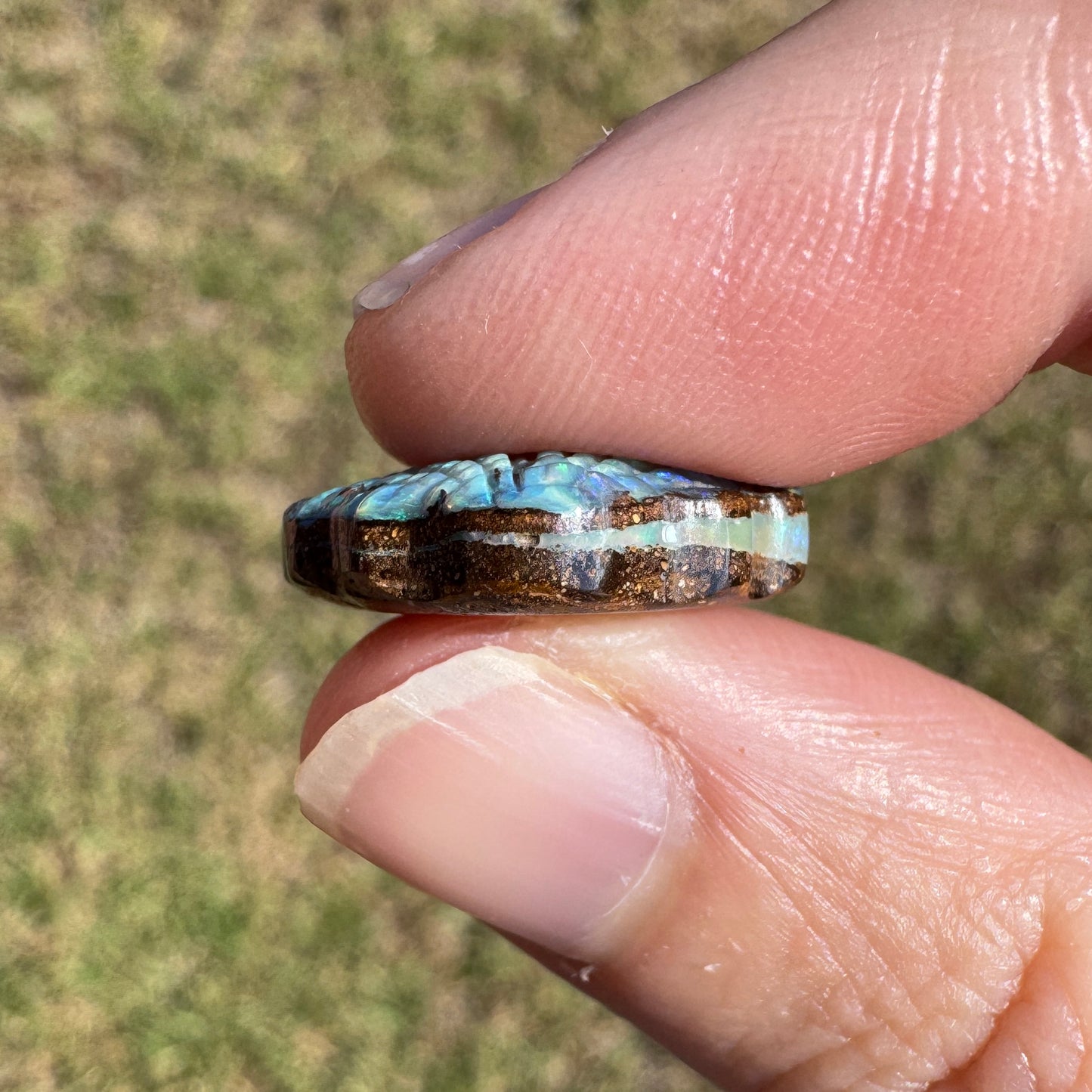 10.22 Ct shell boulder opal carving