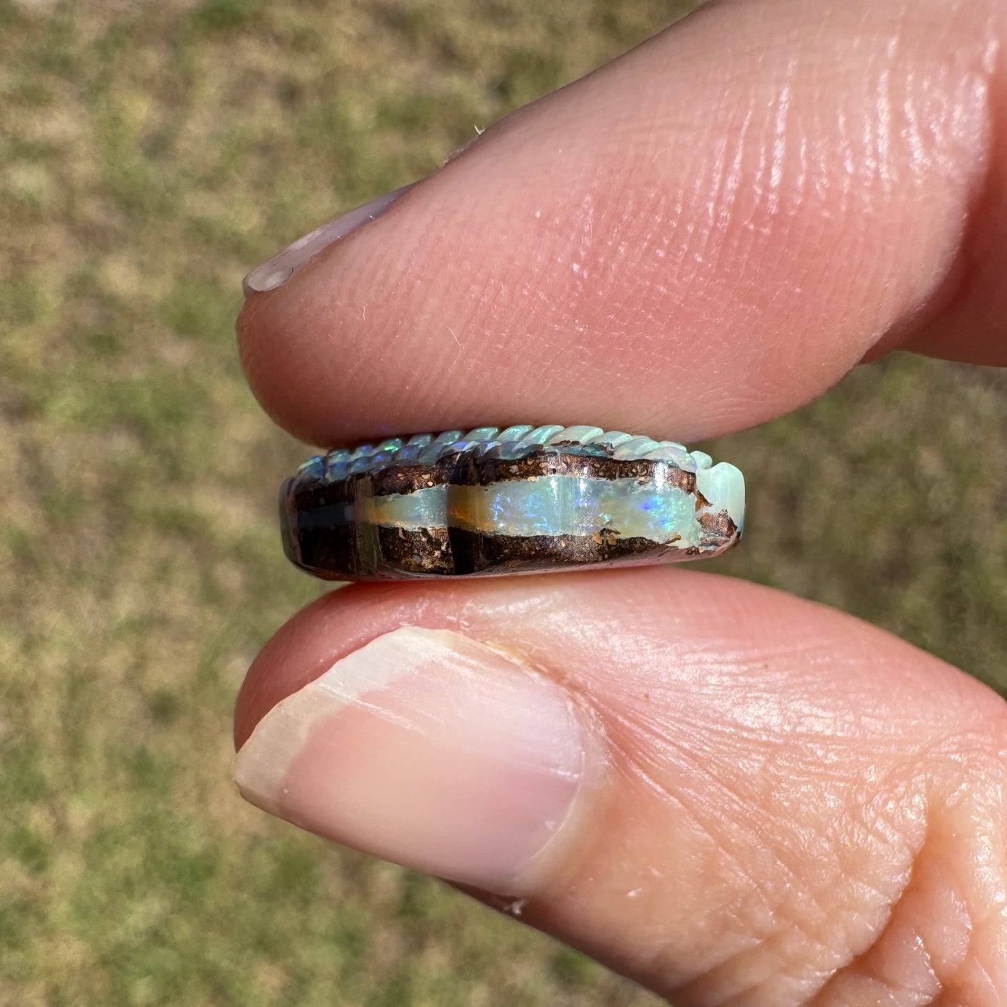10.22 Ct shell boulder opal carving