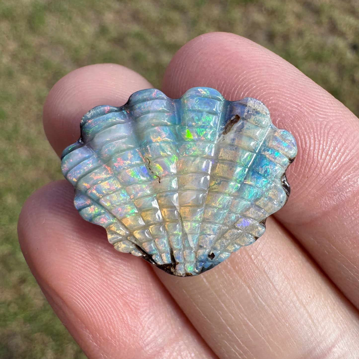 16.97 Ct shell boulder opal carving