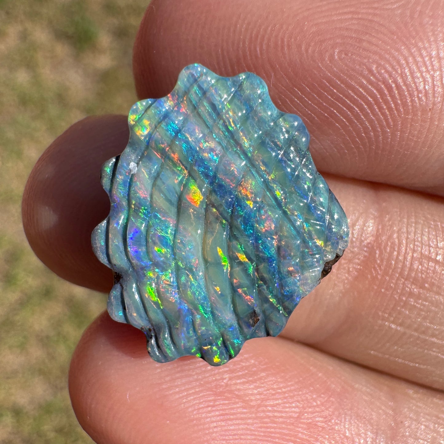 9.11 Ct gem-grade shell boulder opal carving