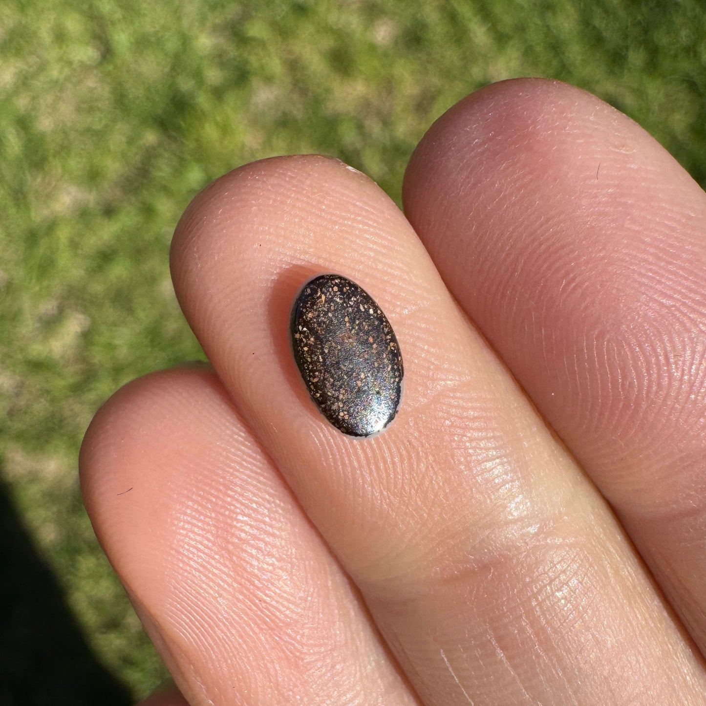 0.63 Ct extra small oval boulder opal