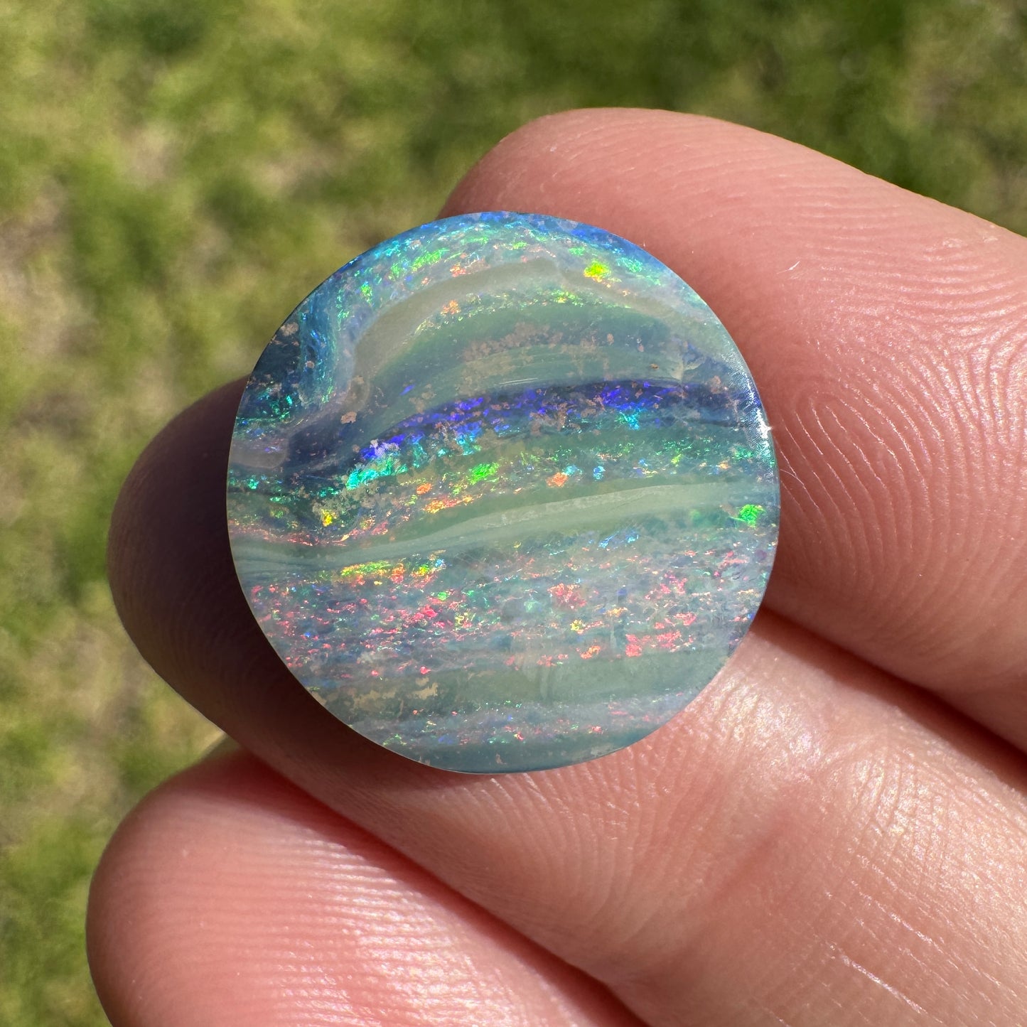 7.75 Ct rainbow stripe circle boulder opal