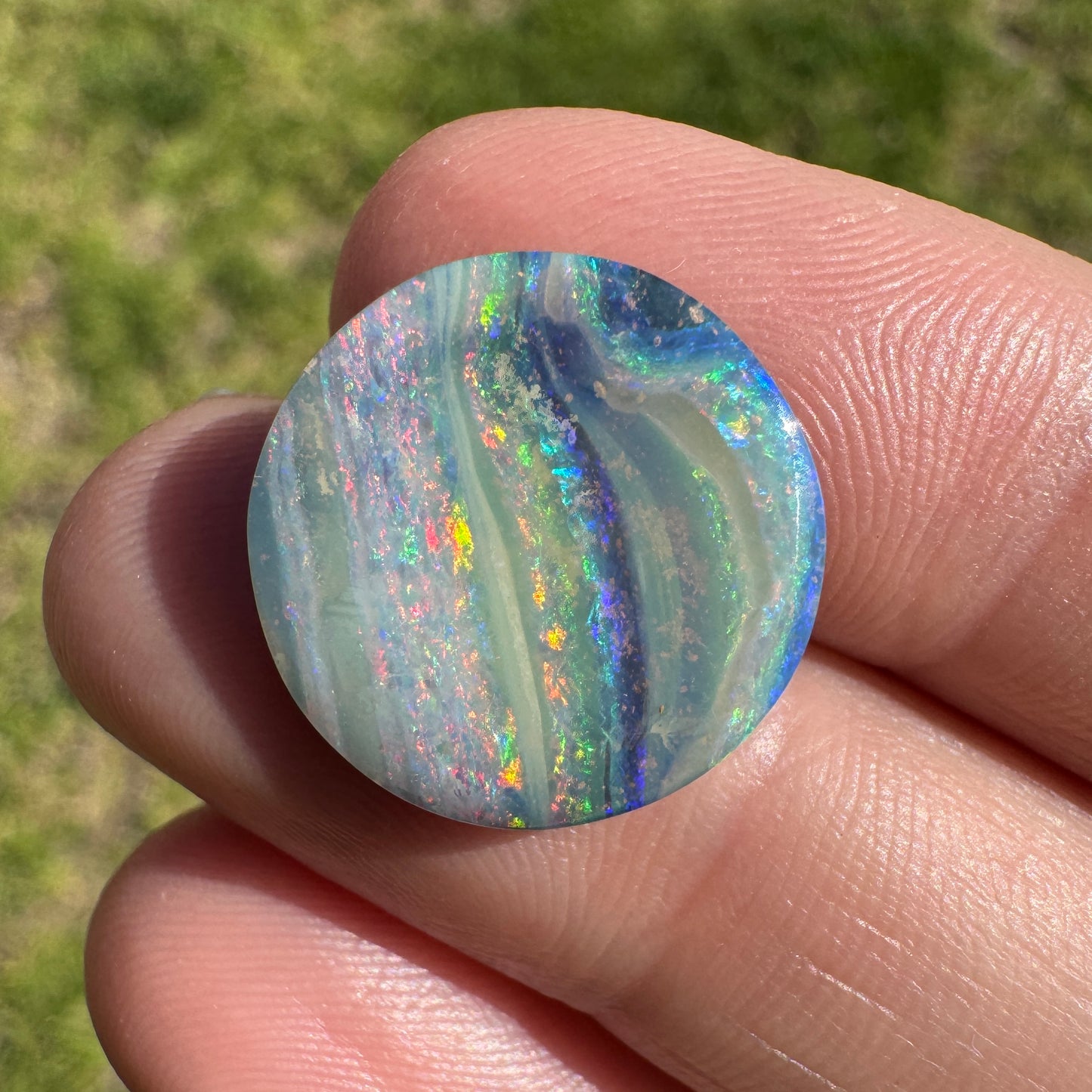 7.75 Ct rainbow stripe circle boulder opal