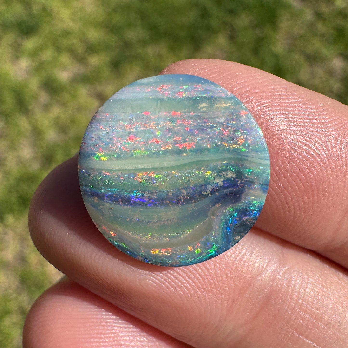 7.75 Ct rainbow stripe circle boulder opal
