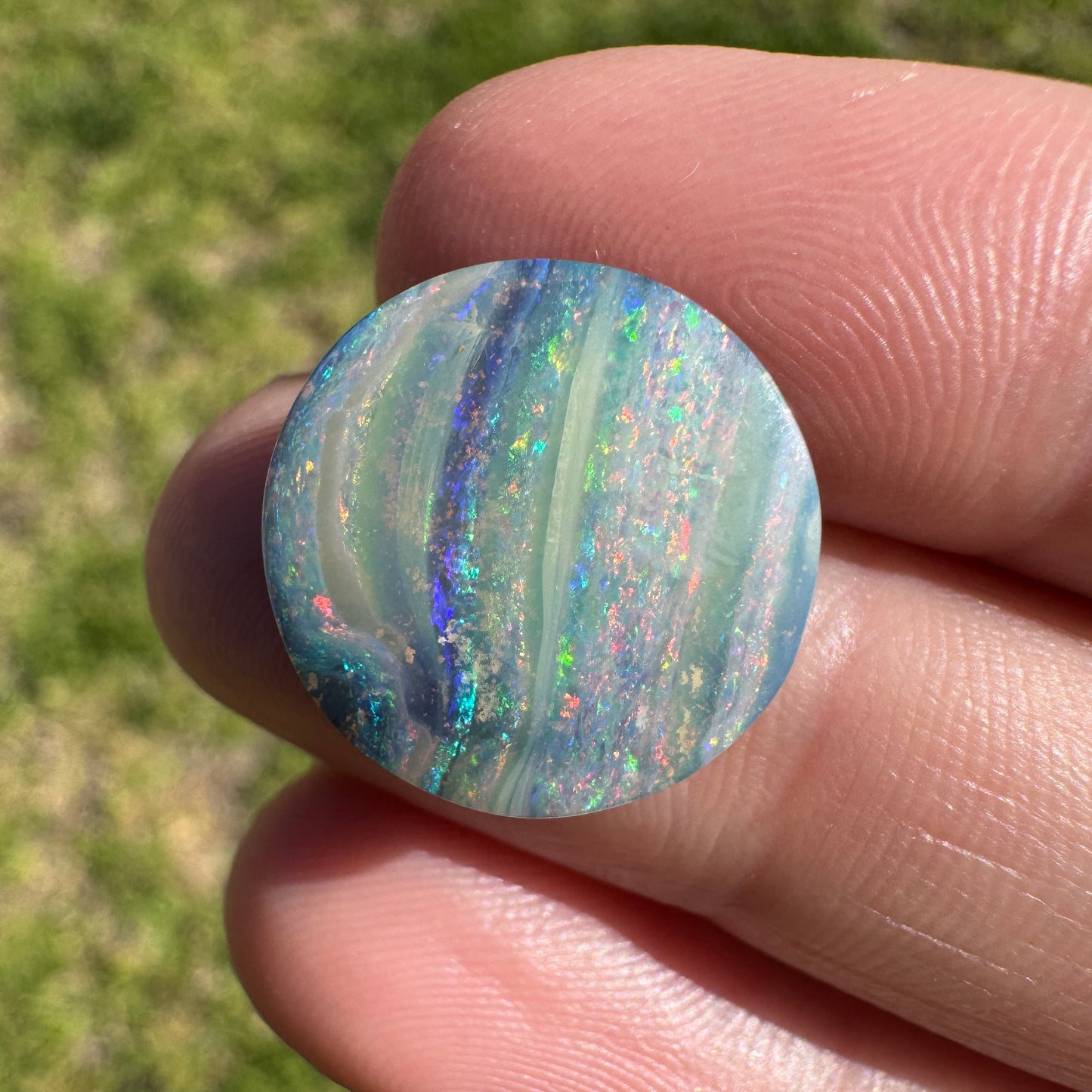 7.75 Ct rainbow stripe circle boulder opal