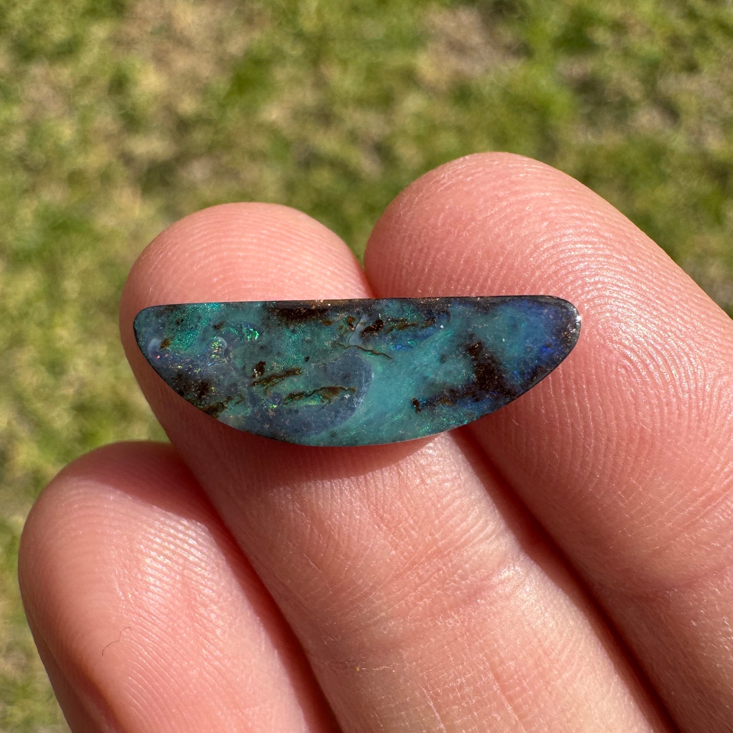 3.59 Ct half-circle boulder opal