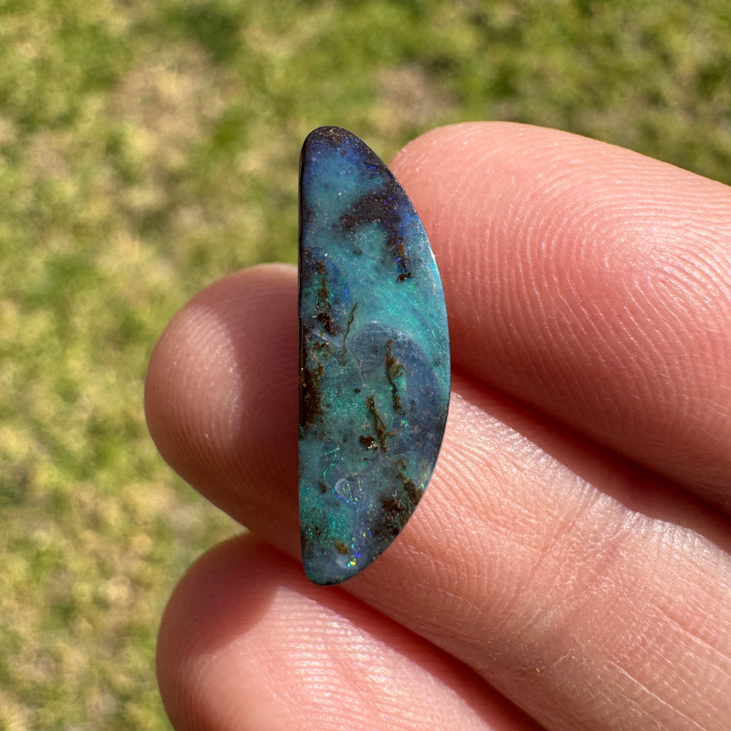 3.59 Ct half-circle boulder opal