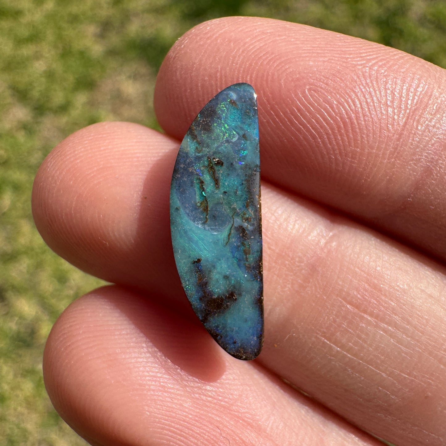 3.59 Ct half-circle boulder opal