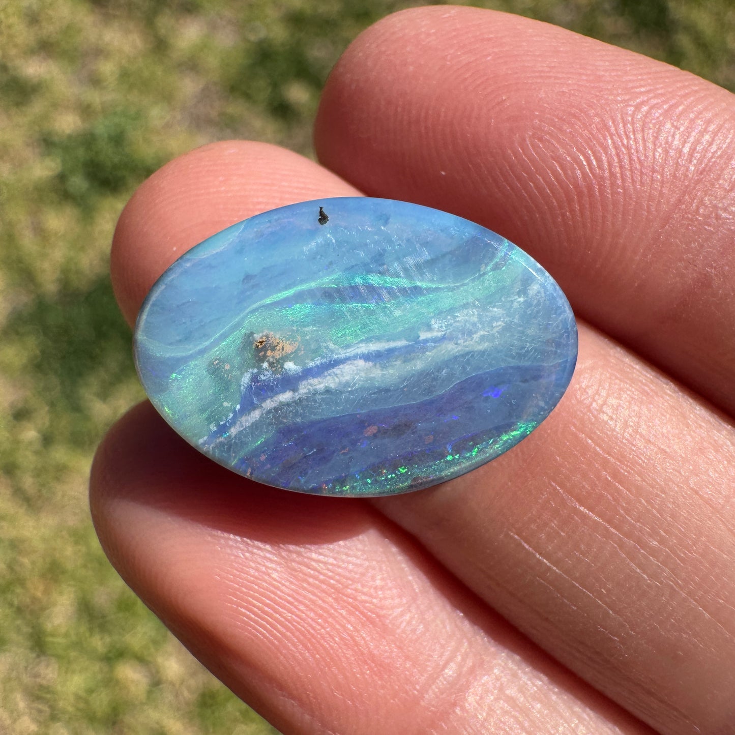 8.60 Ct green-blue oval boulder opal