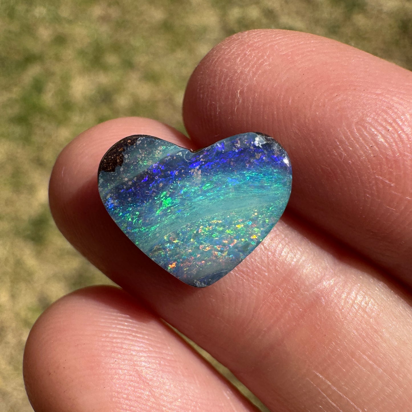 3.92 Ct blue-stripe heart boulder opal