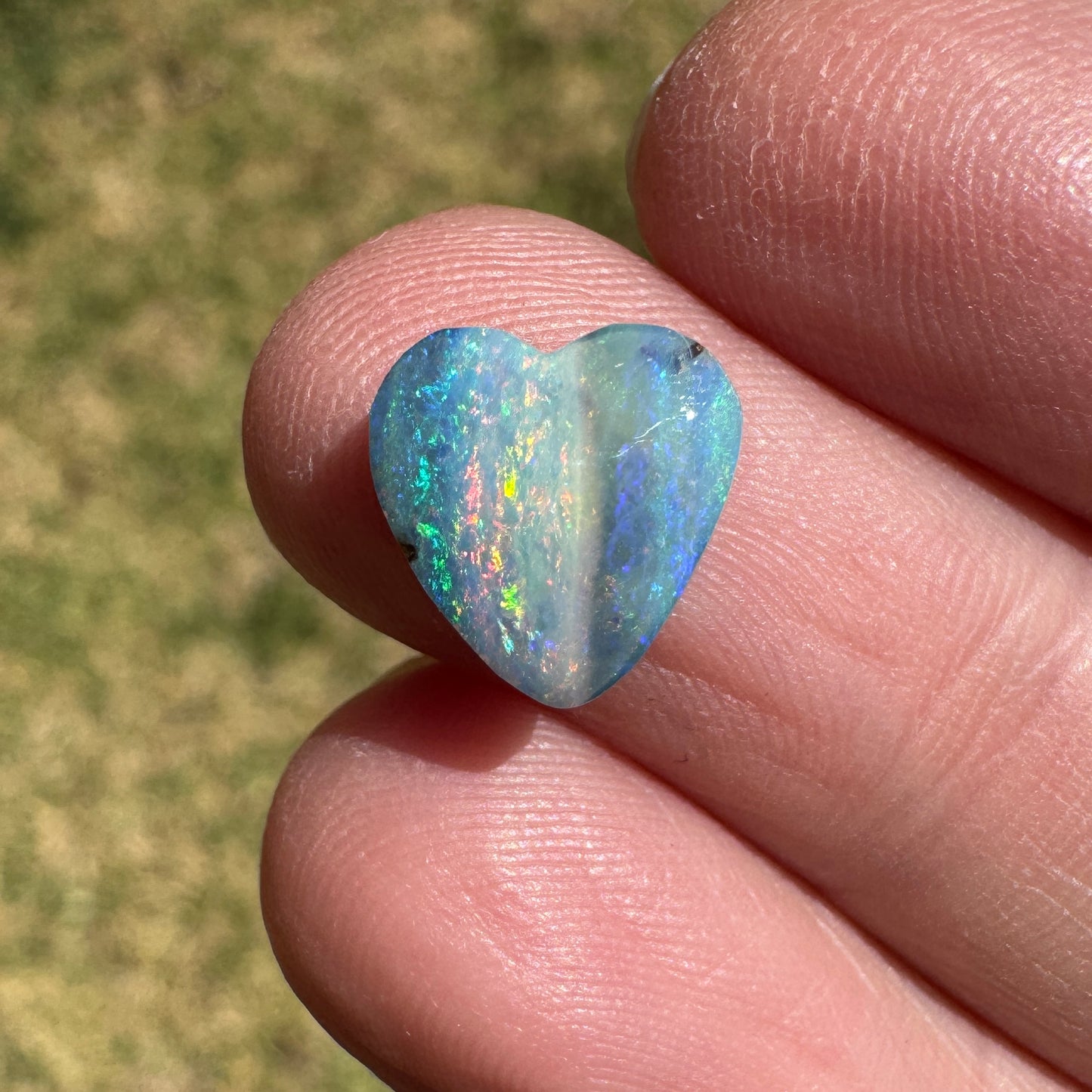 2.27 Ct small rainbow boulder opal heart