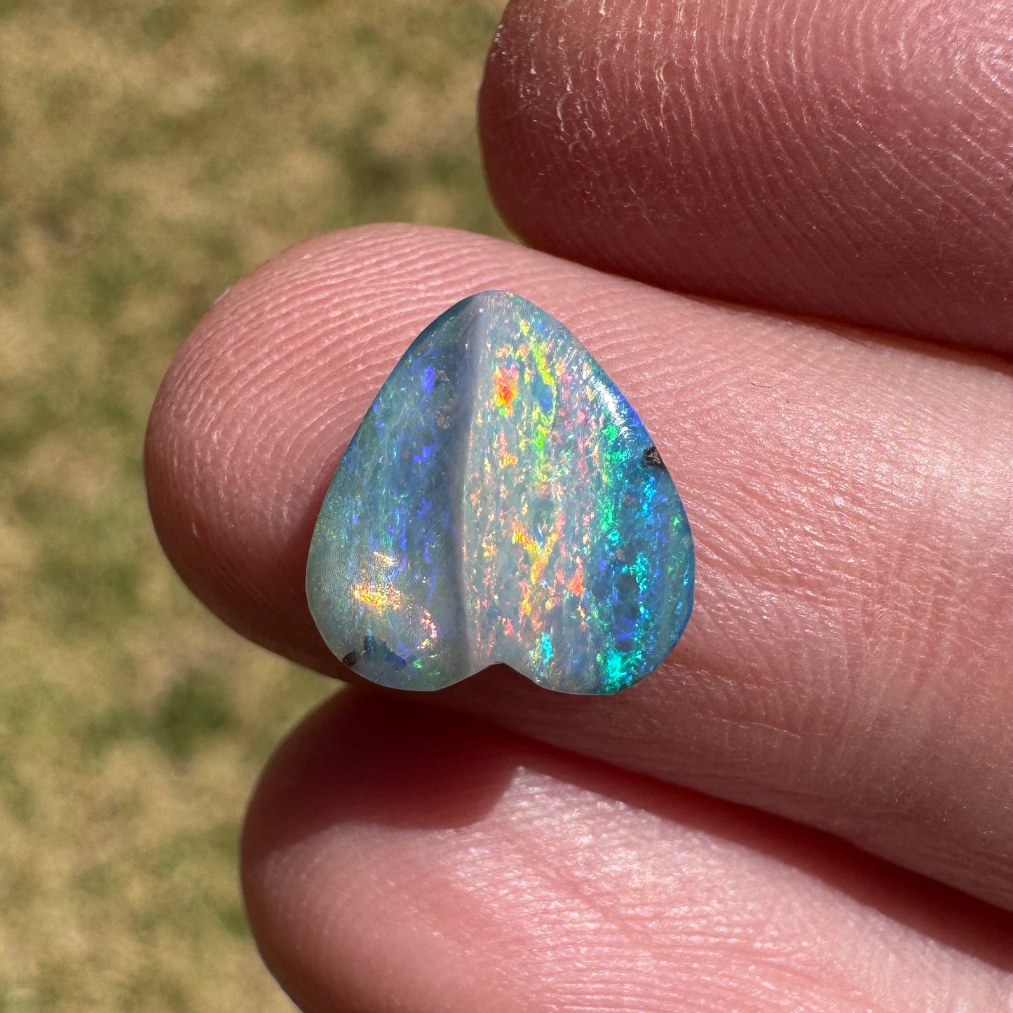2.27 Ct small rainbow boulder opal heart