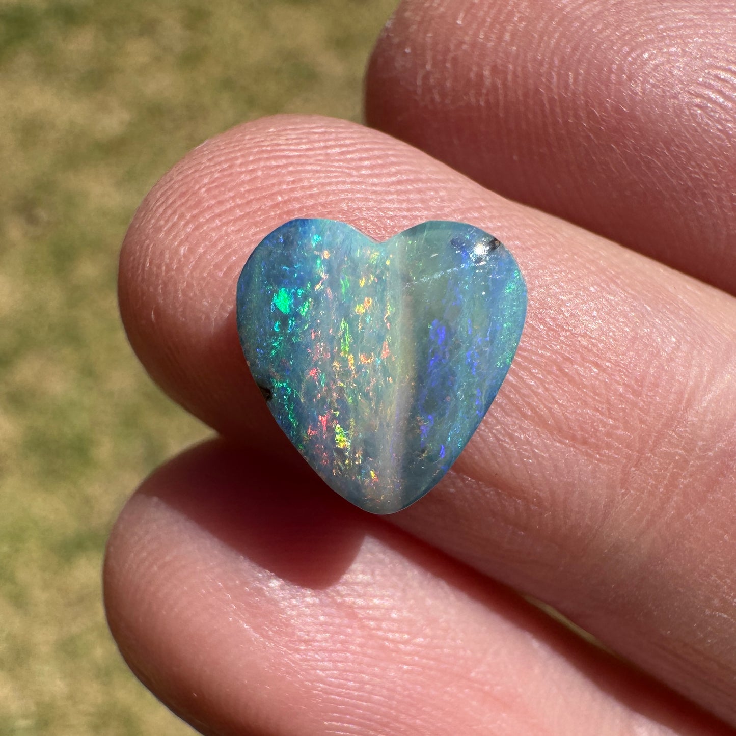 2.27 Ct small rainbow boulder opal heart