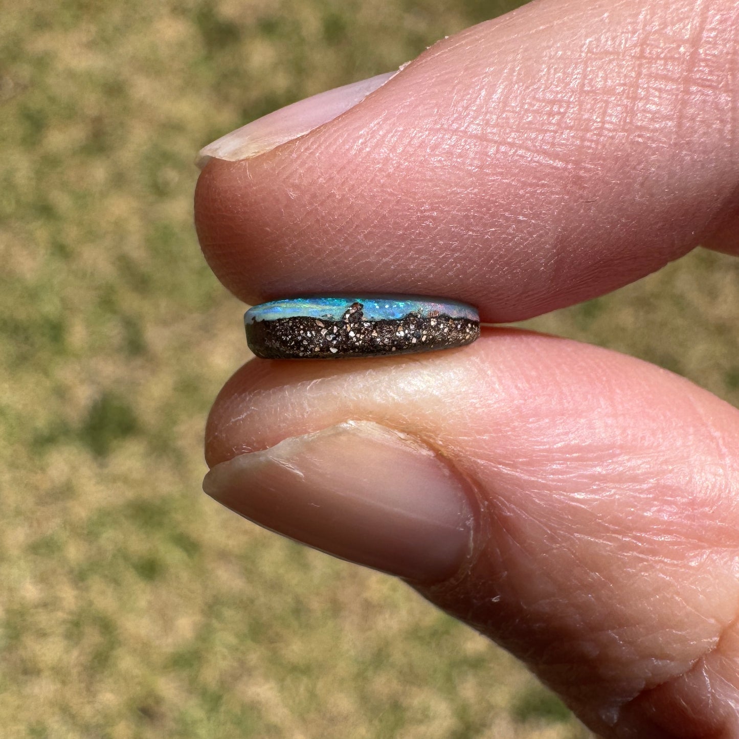 2.27 Ct small rainbow boulder opal heart