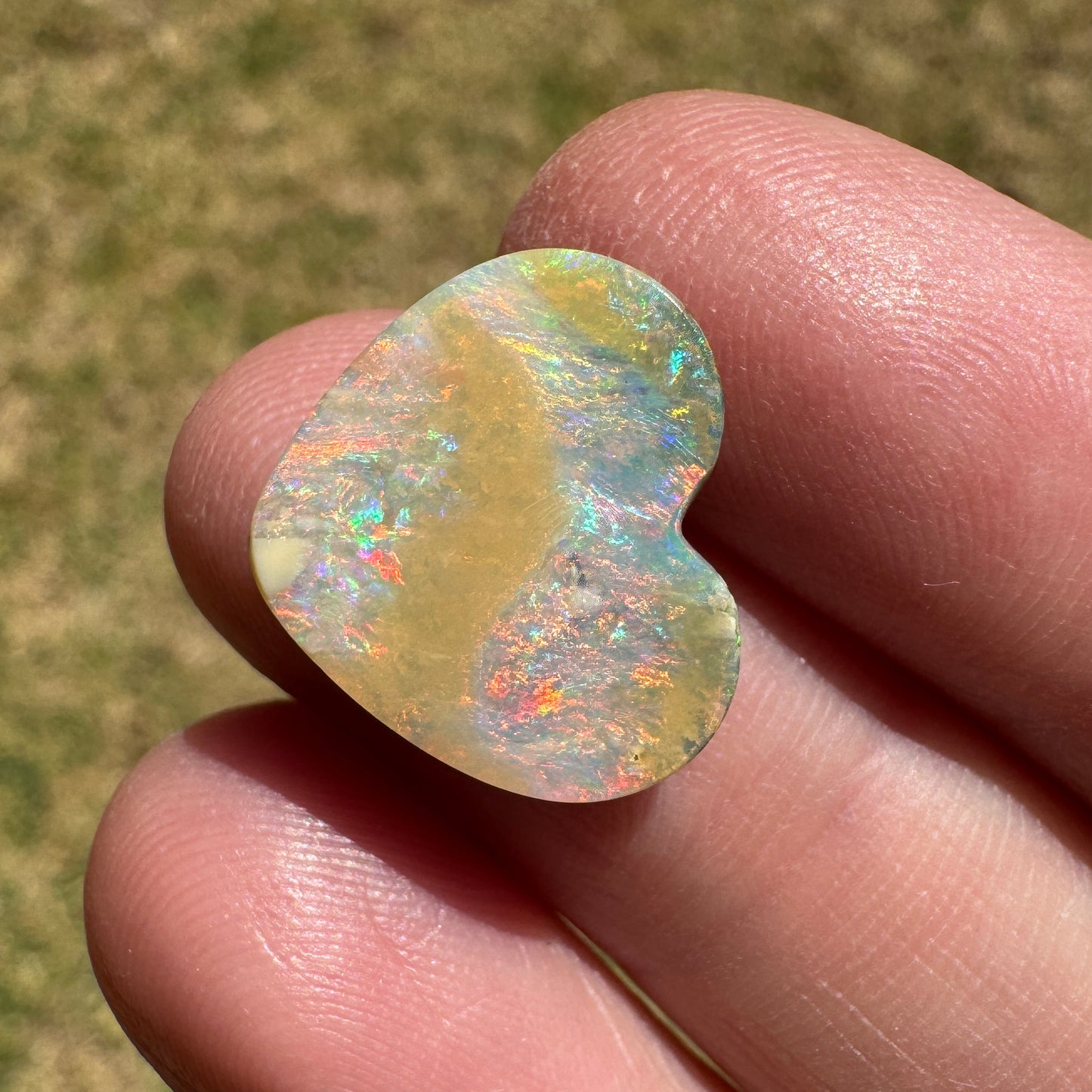 5.65 Ct rainbow and caramel swirl heart boulder opal